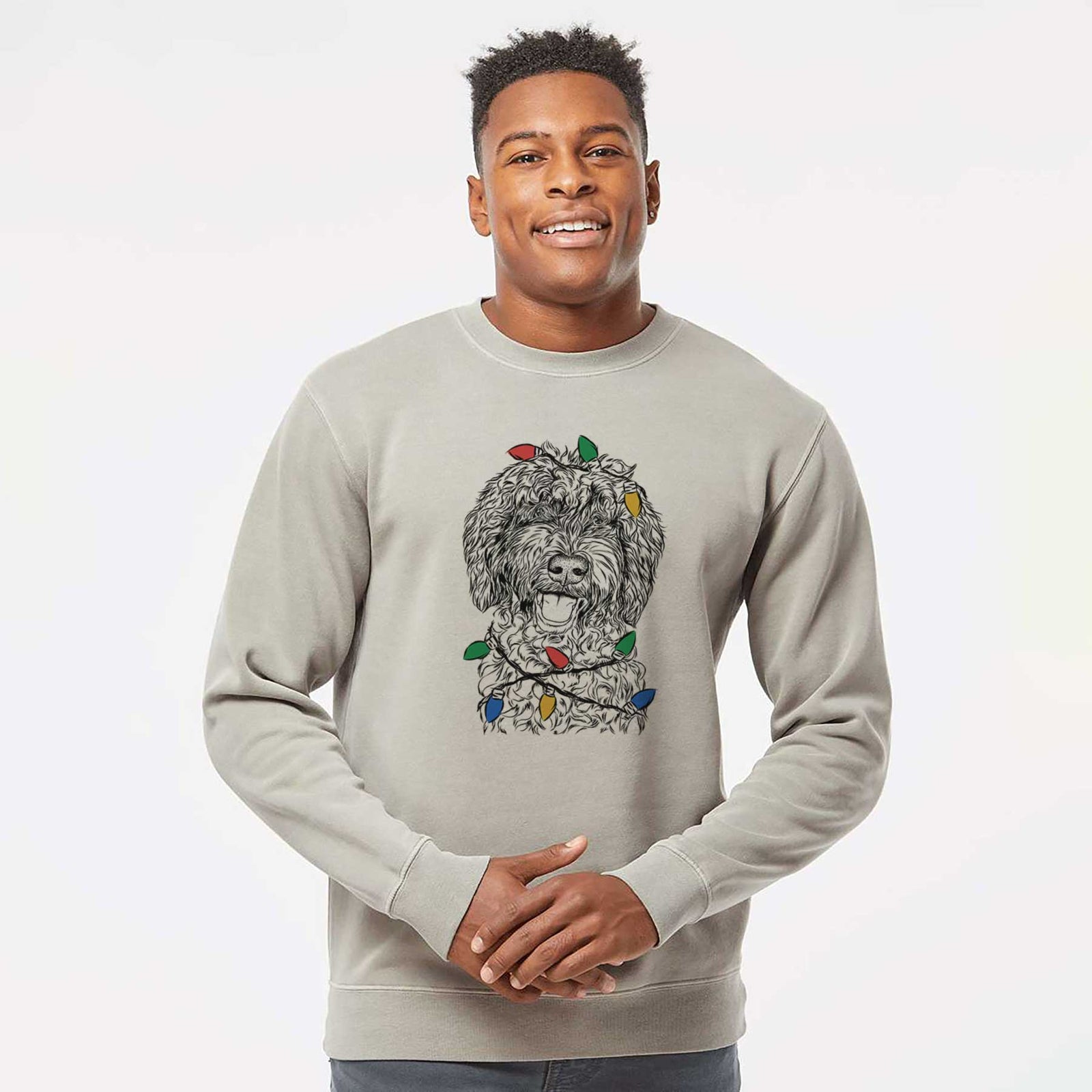 Hand-drawn sketch of Jack the Chocolate Labradoodle wrapped in Christmas lights on a Cement Unisex pigment dyed crew sweatshirt