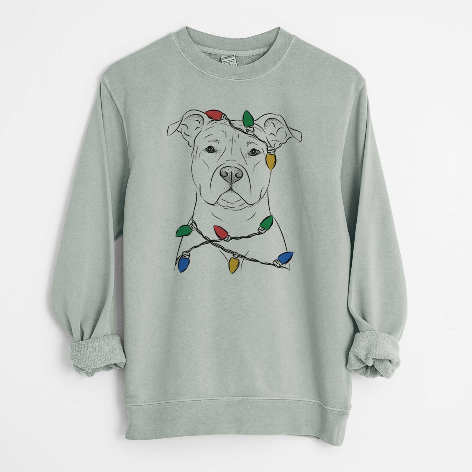 Hand-drawn sketch of Jethro the American Staffordshire Terrier wrapped in Christmas lights on a Sage Unisex pigment dyed crew sweatshirt