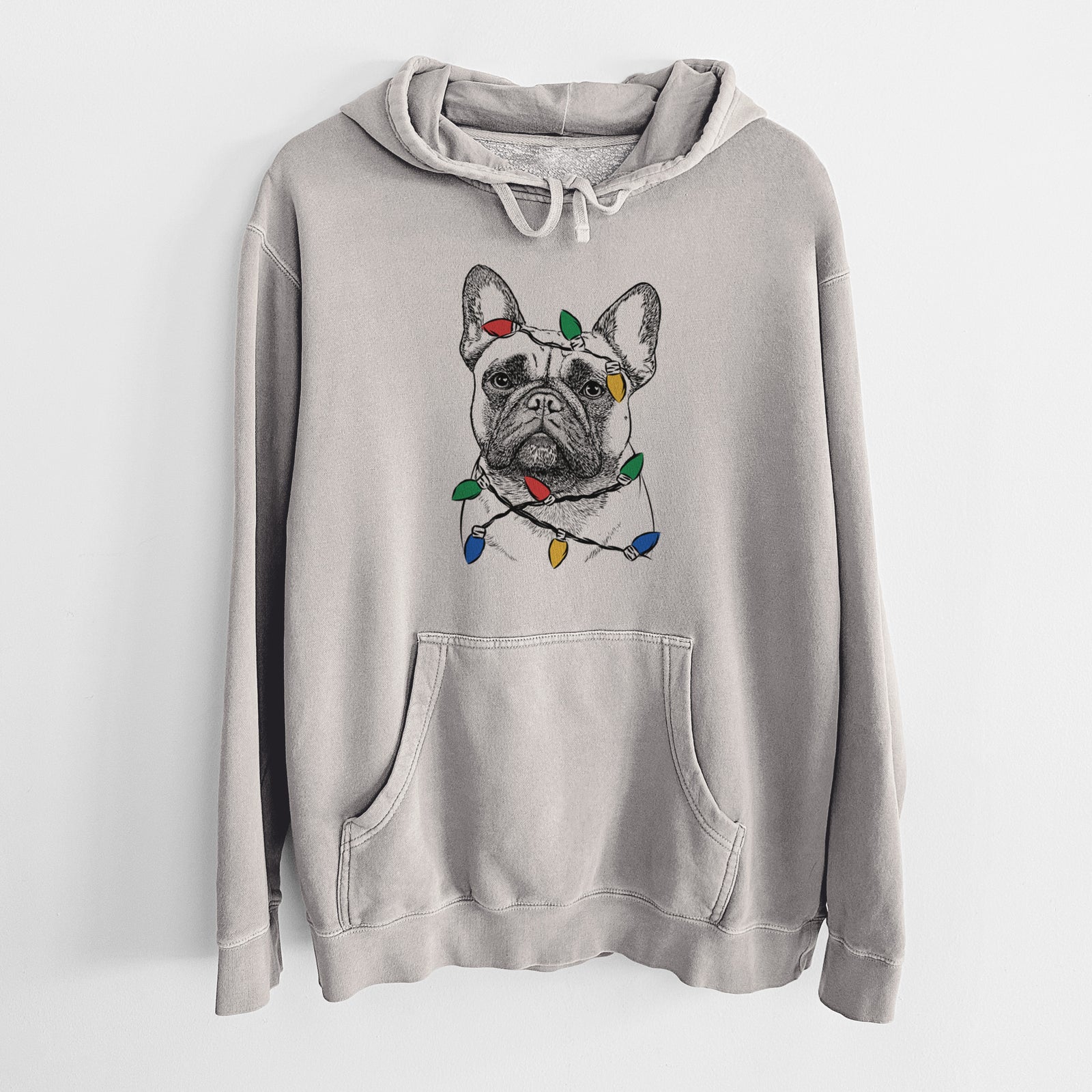 Hand-drawn sketch of Kingsleigh the French Bulldog wrapped in Christmas lights on a Cement Unisex pigment dyed hoodie