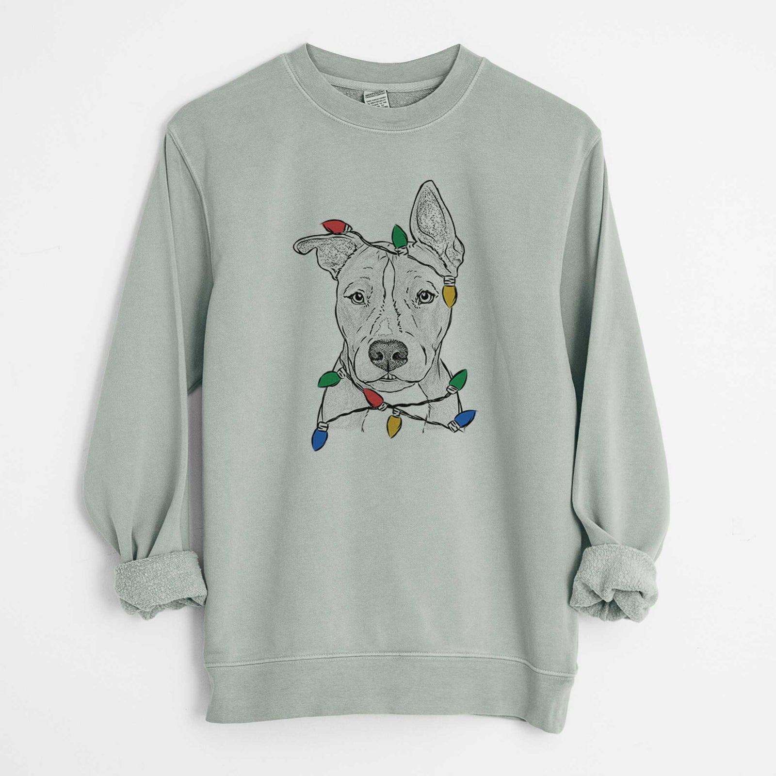 Hand-drawn sketch of Kisses the Pitbull wrapped in Christmas lights on a Sage Unisex pigment dyed crew sweatshirt