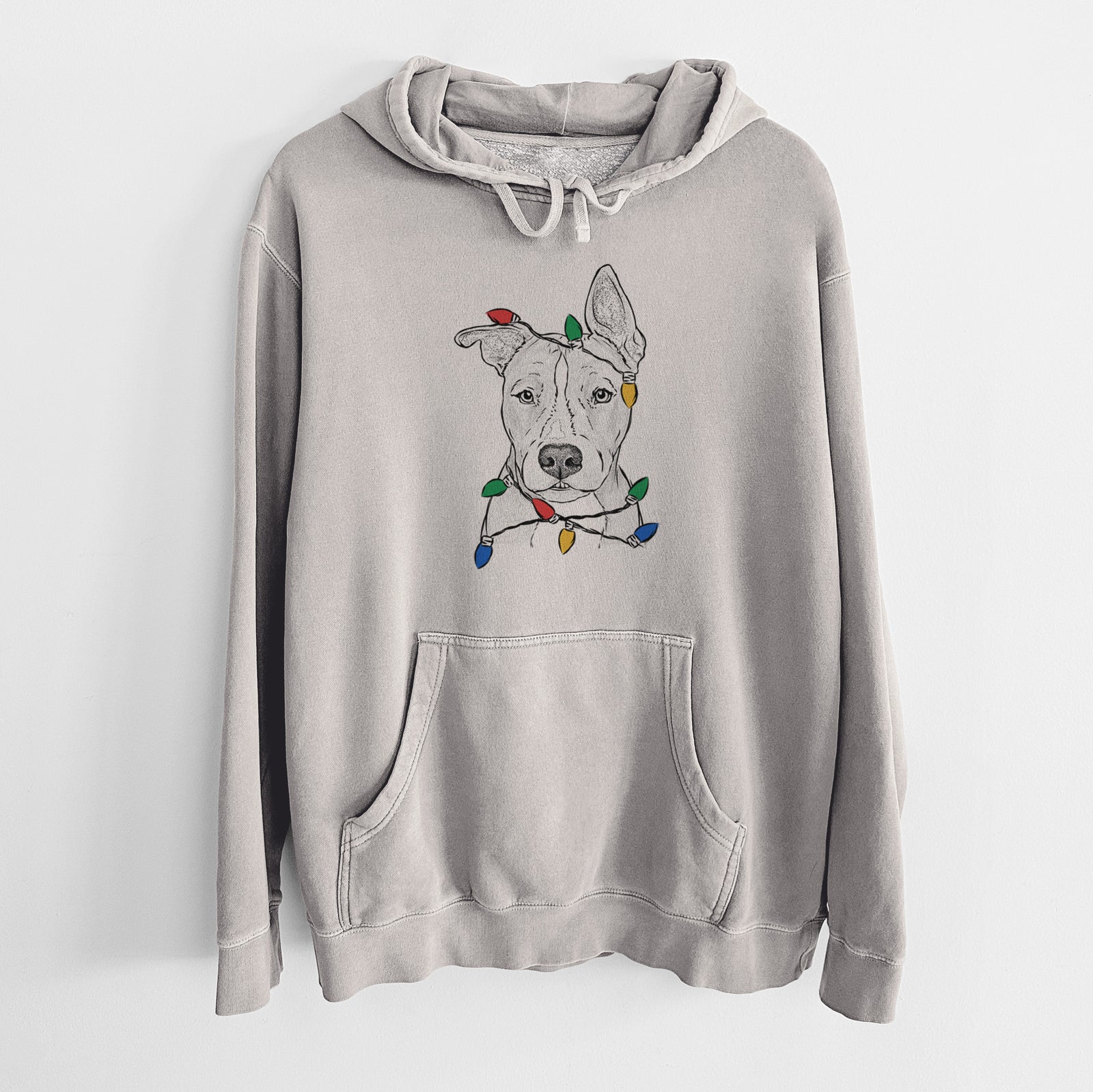 Hand-drawn sketch of Kisses the Pitbull wrapped in Christmas lights on a Cement Unisex pigment dyed hoodie