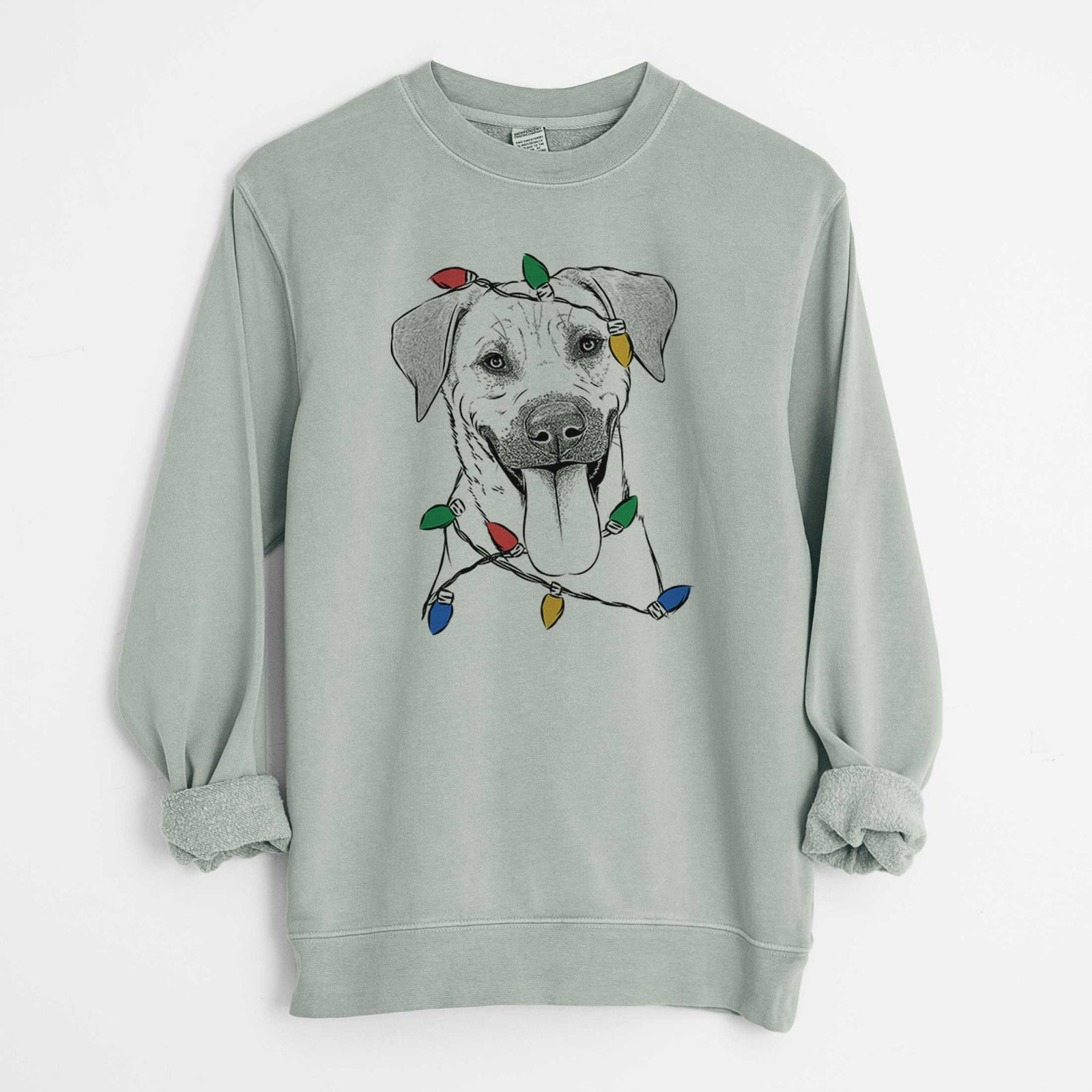 Hand-drawn sketch of Koda the Black Mouth Cur wrapped in Christmas lights on a Sage Unisex pigment dyed crew sweatshirt