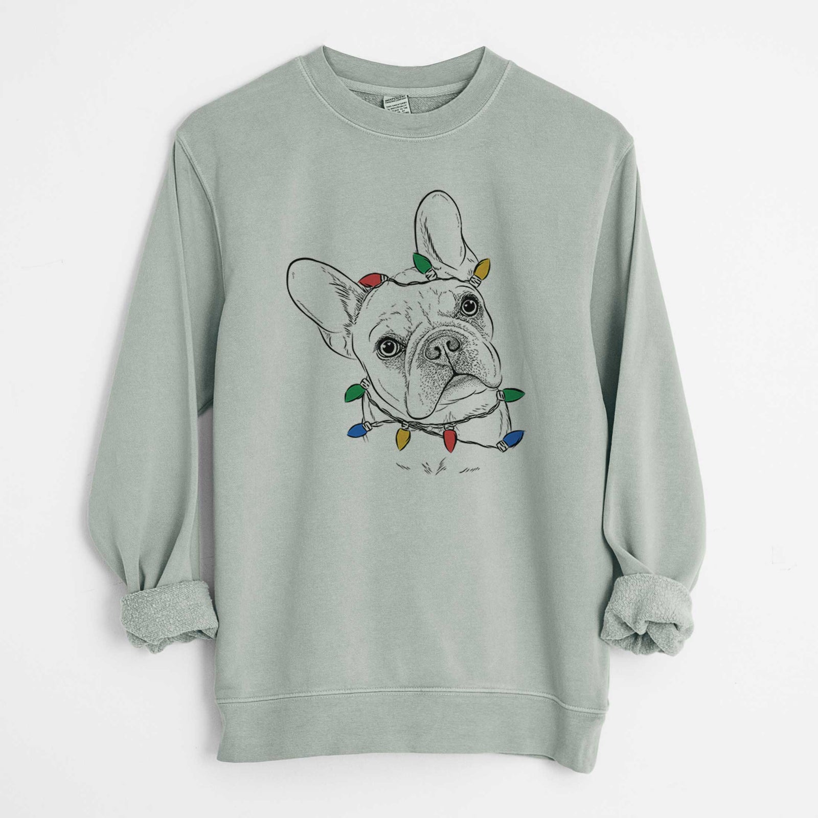 Hand-drawn sketch of Loki the French Bulldog wrapped in Christmas lights on a Sage Unisex pigment dyed crew sweatshirt