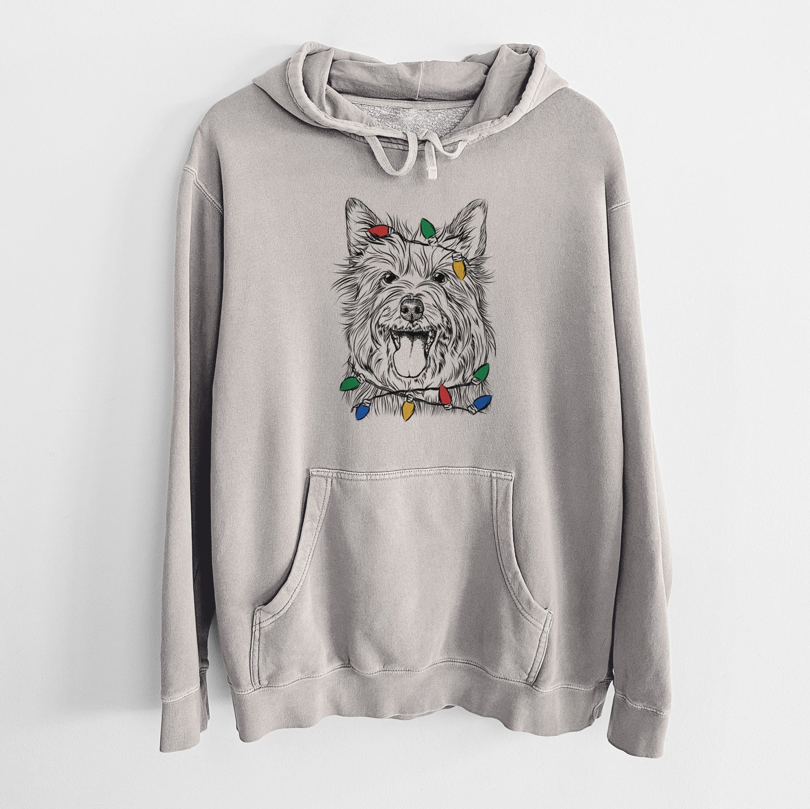 Hand-drawn sketch of Middy the Australian Terrier wrapped in Christmas lights on a Cement Unisex pigment dyed hoodie