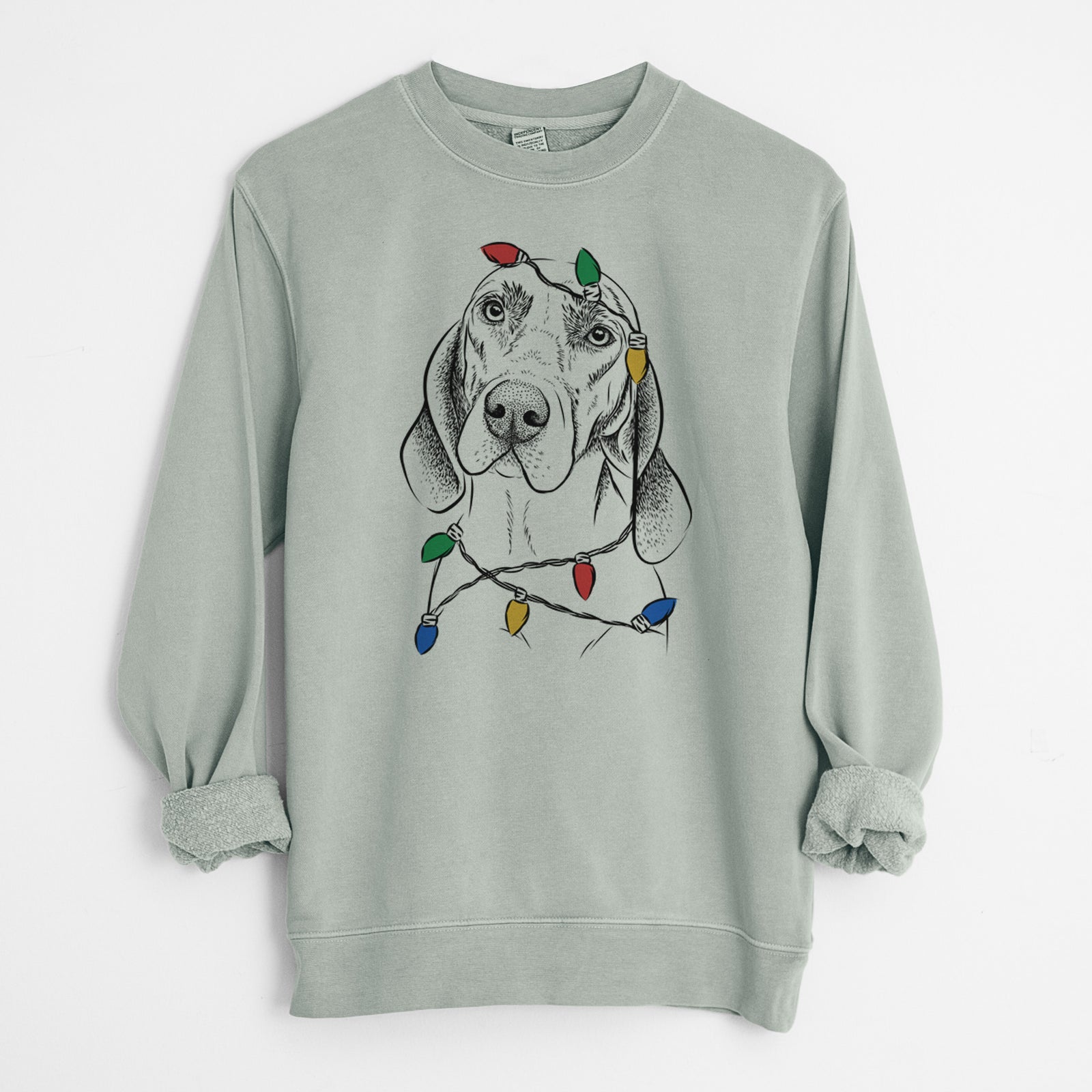 Hand-drawn sketch of Norman the Plott Hound wrapped in Christmas lights on a Sage Unisex pigment dyed crew sweatshirt