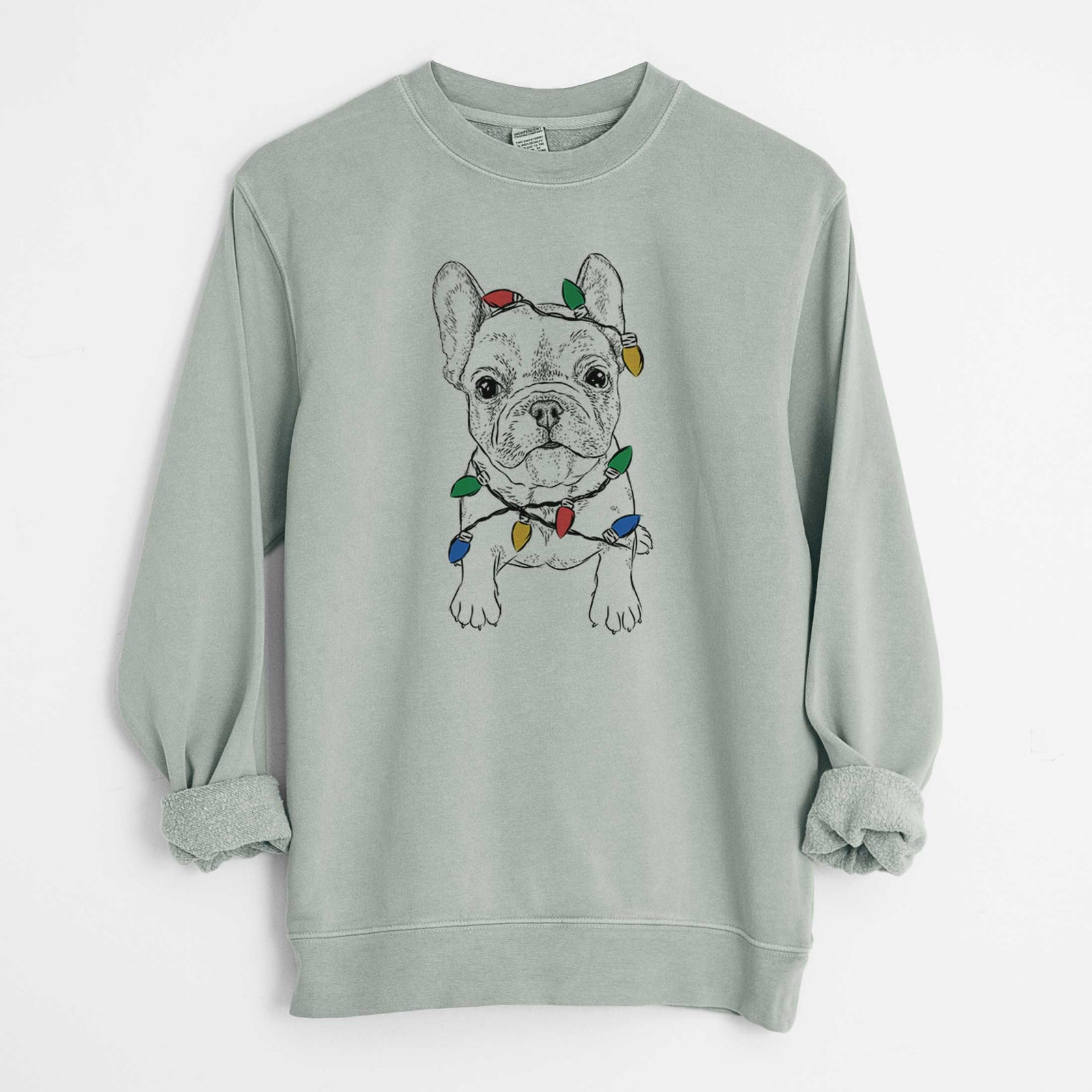 Hand-drawn sketch of Puppy Pierre the French Bulldog wrapped in Christmas lights on a Sage Unisex pigment dyed crew sweatshirt