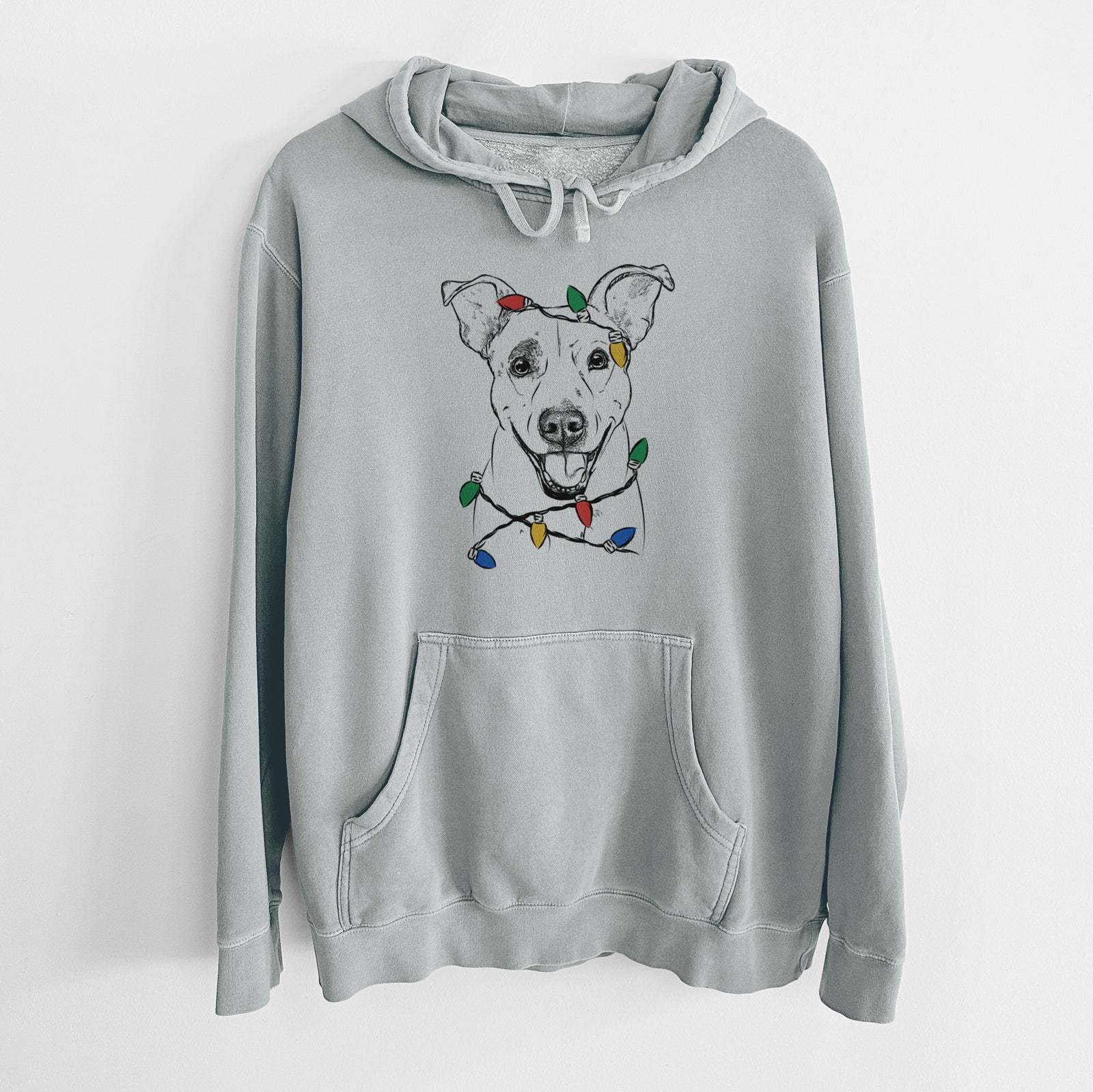 Hand-drawn sketch of Ralphie the Mixed Breed wrapped in Christmas lights on a Sage Unisex pigment dyed hoodie