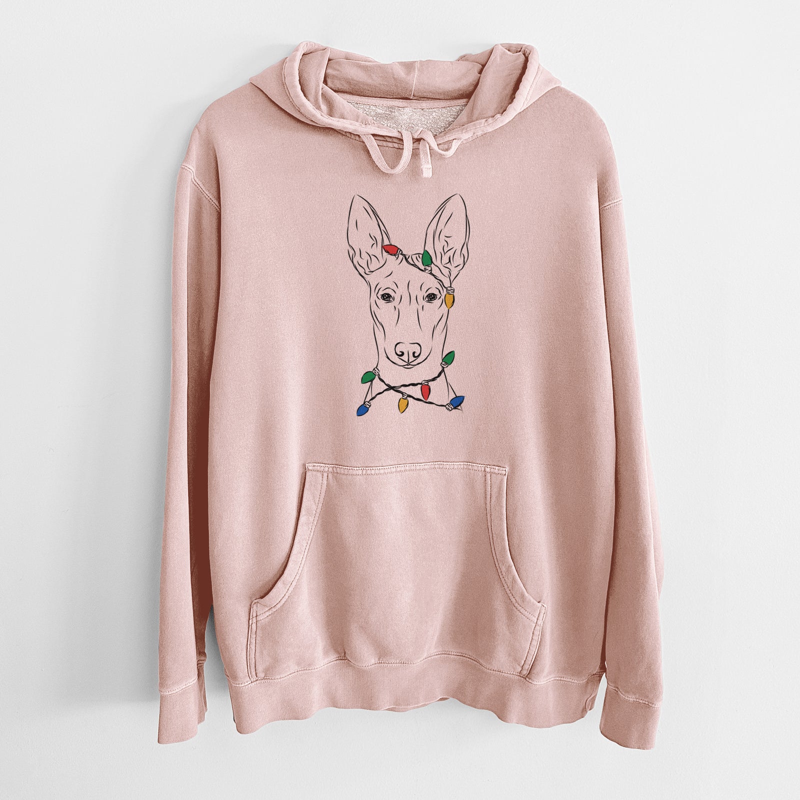 Hand-drawn sketch of Ruadh the Pharaoh Hound wrapped in Christmas lights on a Dusty Pink Unisex pigment dyed hoodie