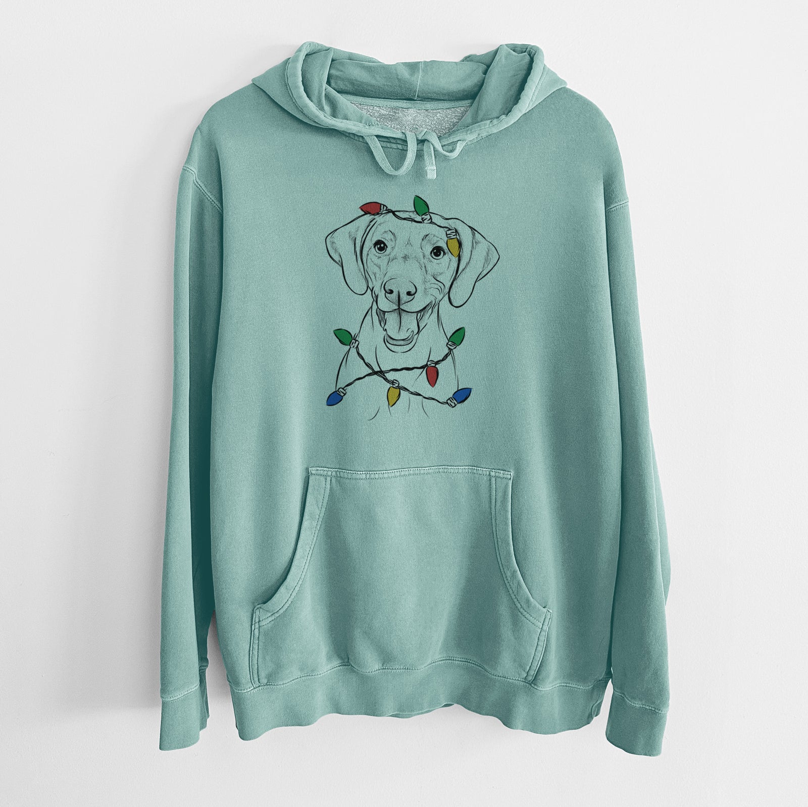 Hand-drawn sketch of Ruby the Vizsla wrapped in Christmas lights on a Mint Unisex pigment dyed hoodie