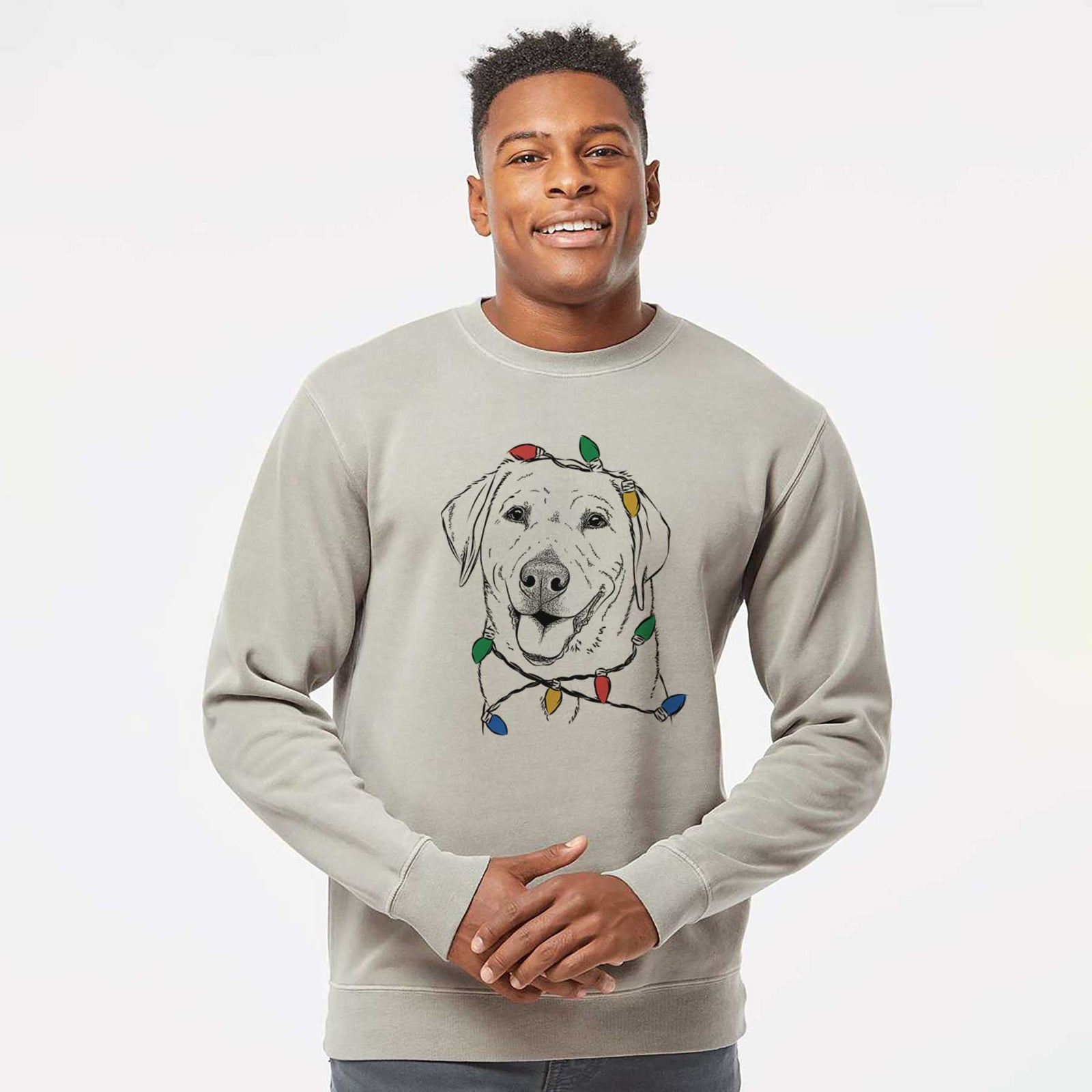 Hand-drawn sketch of Sanford the Labrador Retriever wrapped in Christmas lights on a Cement Unisex pigment dyed crew sweatshirt