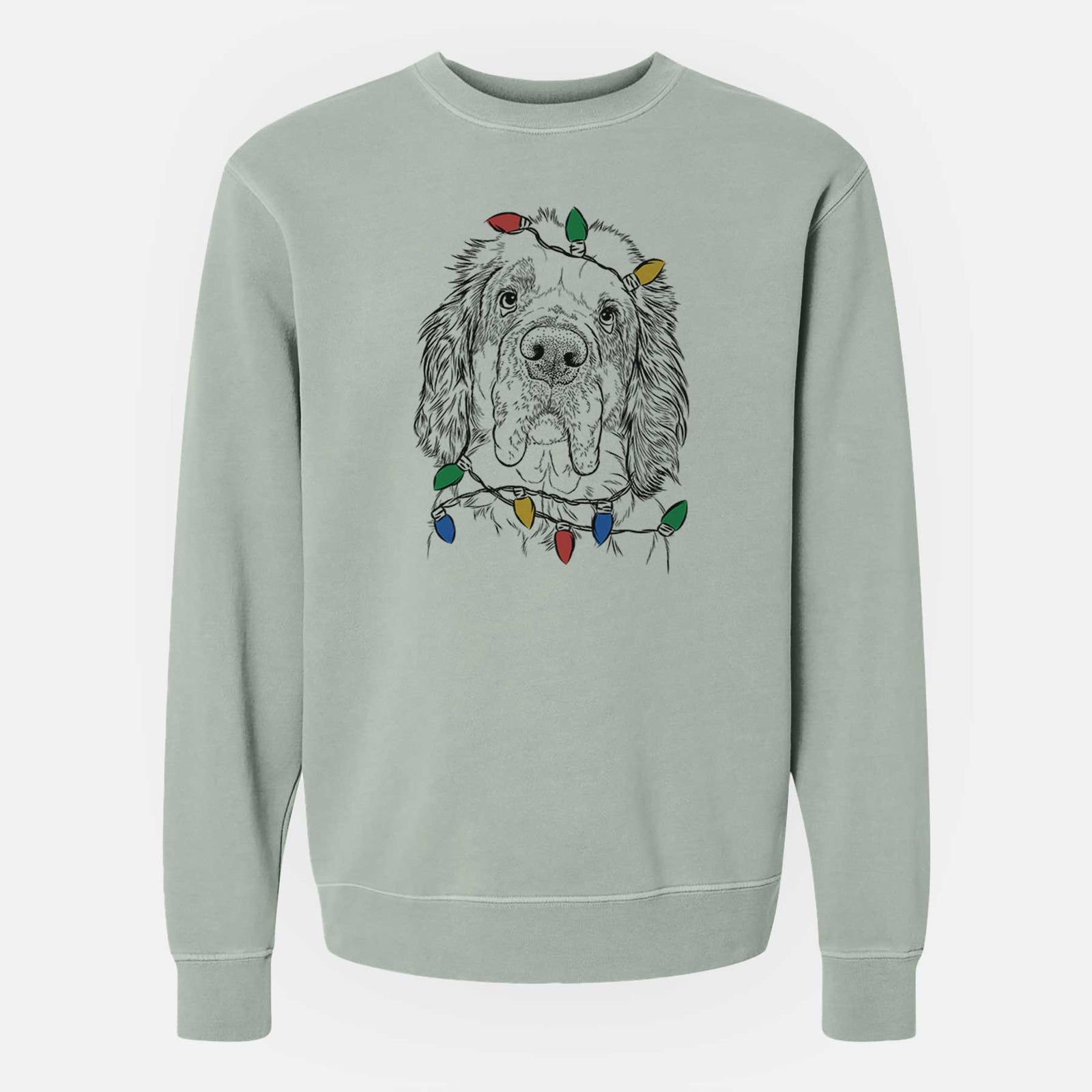 Hand-drawn sketch of Sully the Clumber Spaniel wrapped in Christmas lights on a Sage Unisex pigment dyed crew sweatshirt
