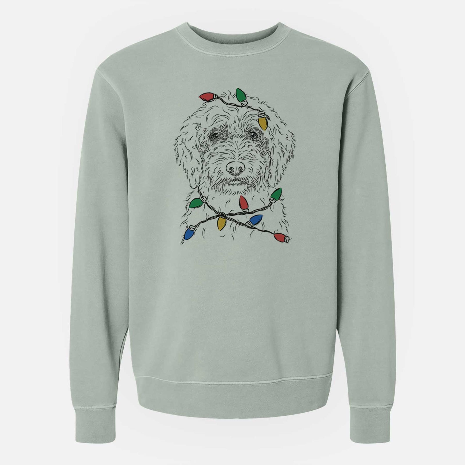 Hand-drawn sketch of Teddy the Labradoodle wrapped in Christmas lights on a Sage Unisex pigment dyed crew sweatshirt