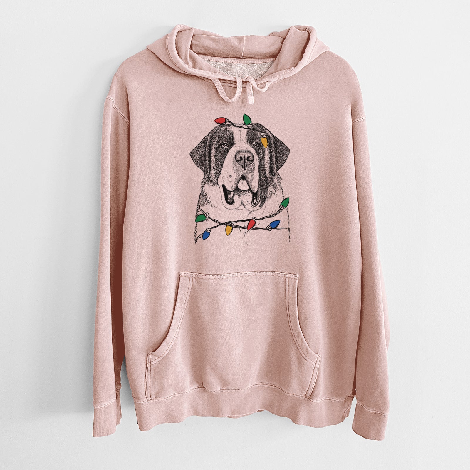Hand-drawn sketch of Thor the Saint Bernard wrapped in Christmas lights on a Dusty Pink Unisex pigment dyed hoodie