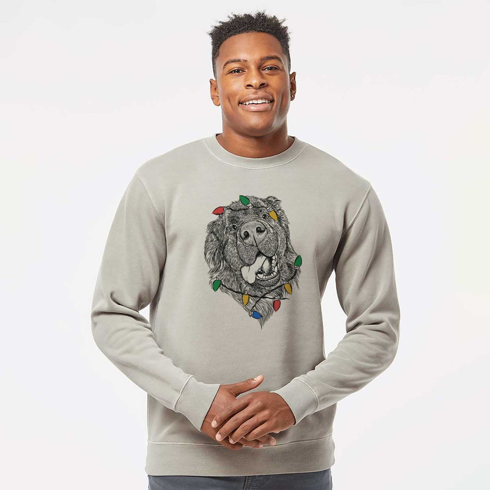 Hand-drawn sketch of Tuna the Newfoundland wrapped in Christmas lights on a Cement Unisex pigment dyed crew sweatshirt
