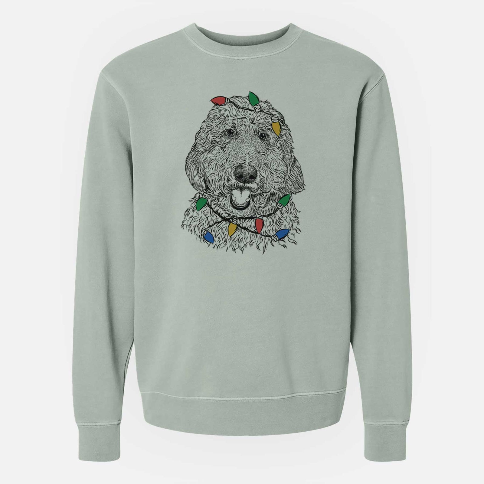 Hand-drawn sketch of Whisper the Goldendoodle wrapped in Christmas lights on a Sage Unisex pigment dyed crew sweatshirt