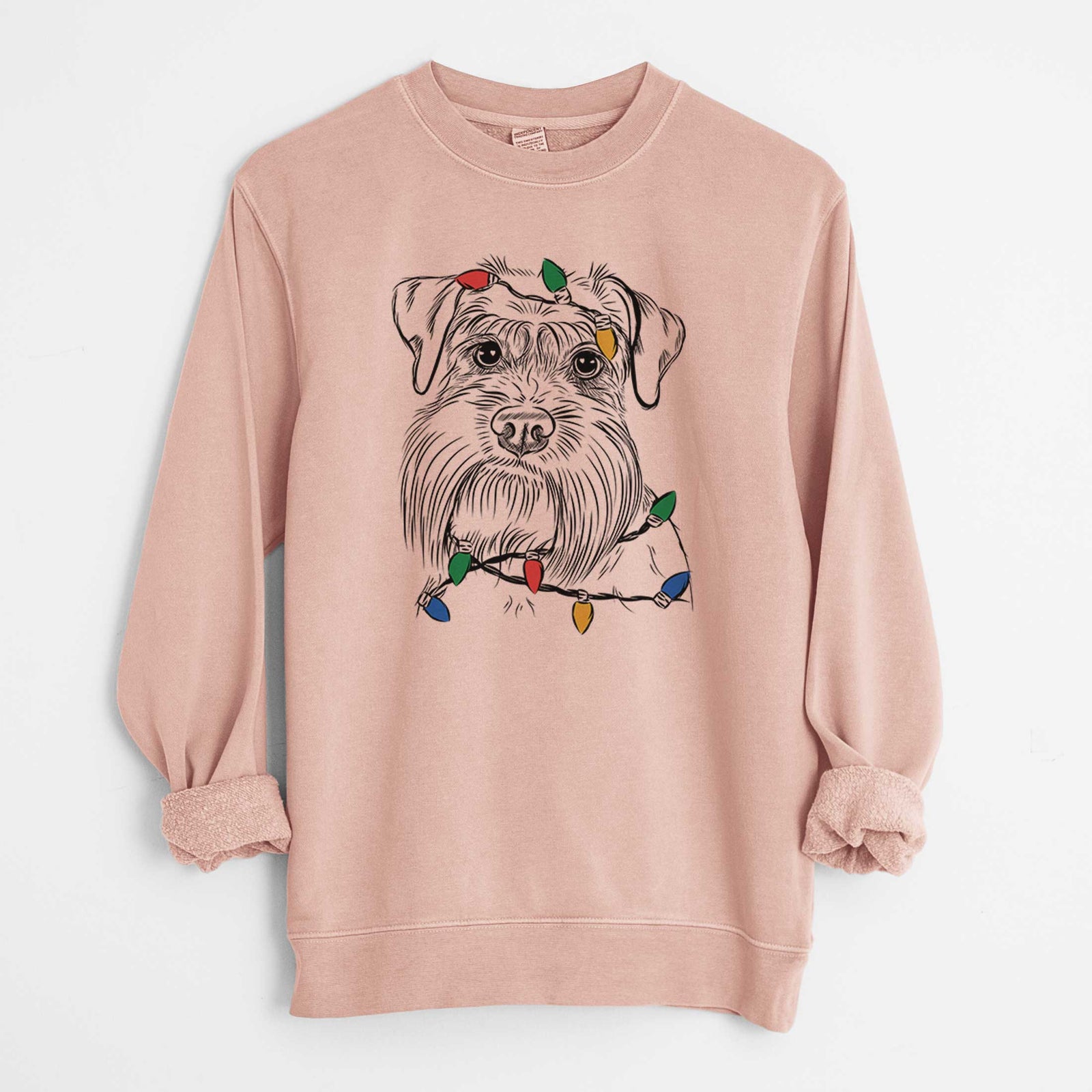 Hand-drawn sketch of Wrigley the Schnauzer wrapped in Christmas lights on a Dusty Pink Unisex pigment dyed crew sweatshirt