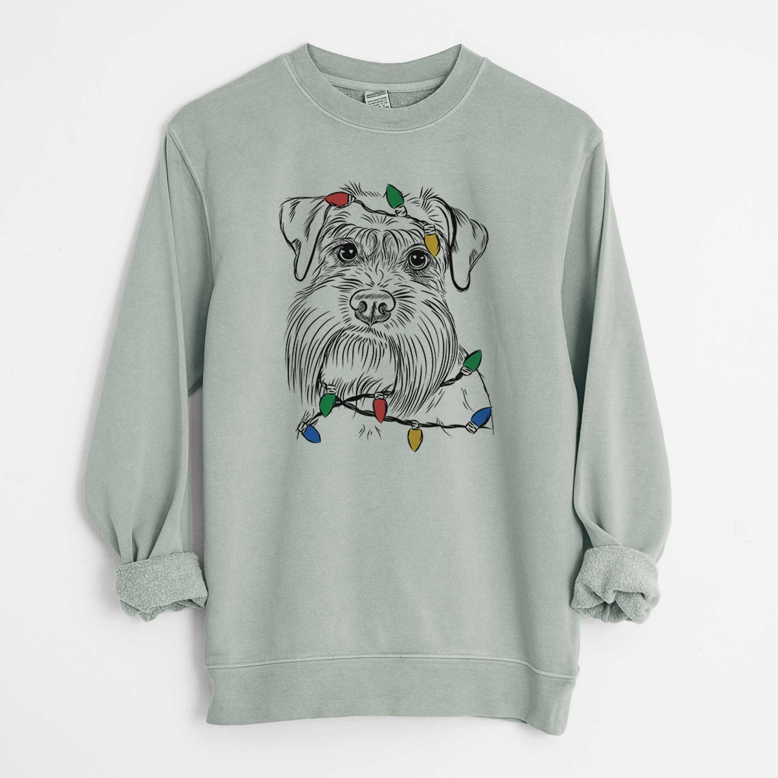 Hand-drawn sketch of Wrigley the Schnauzer wrapped in Christmas lights on a Sage Unisex pigment dyed crew sweatshirt