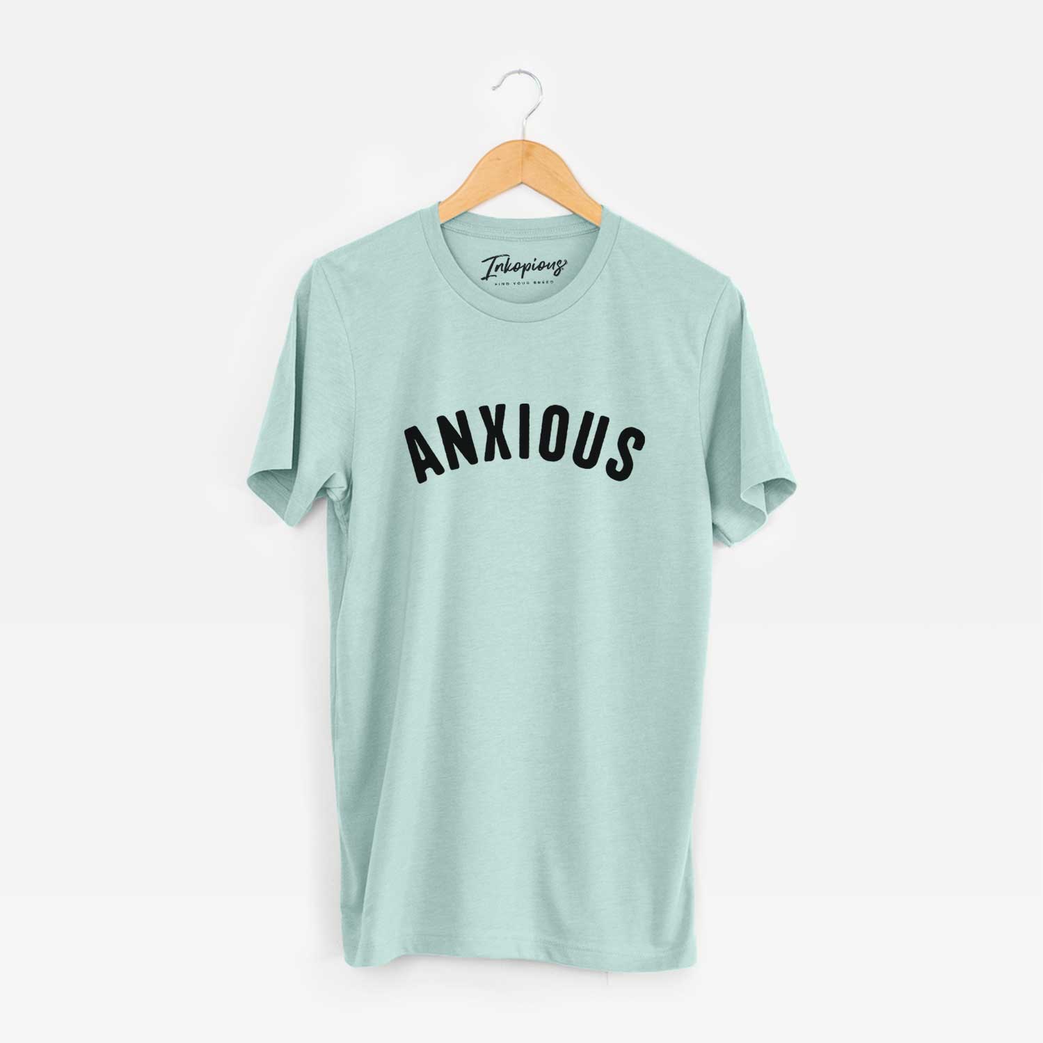 'Anxious - Articulate Collection' design on a Heather Sage Unisex crewneck
