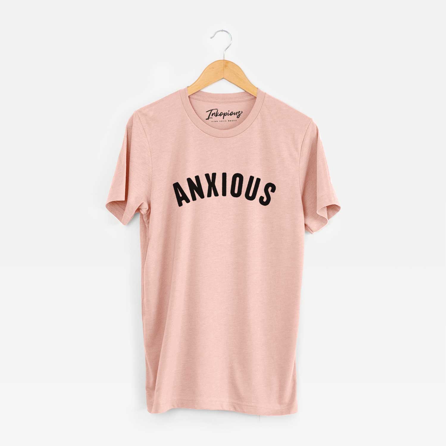 'Anxious - Articulate Collection' design on a Peach Unisex crewneck