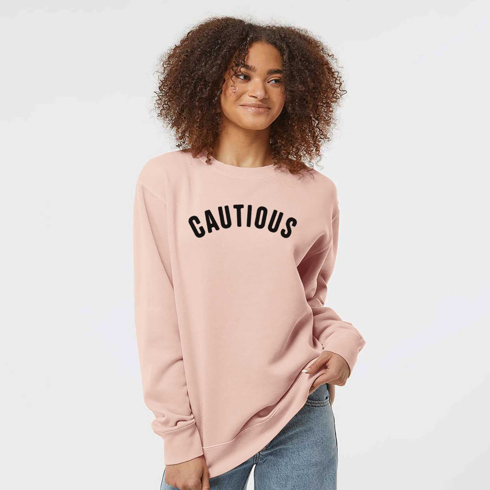 'Cautious - Articulate Collection' design on a Dusty Pink Unisex pigment dyed crew sweatshirt