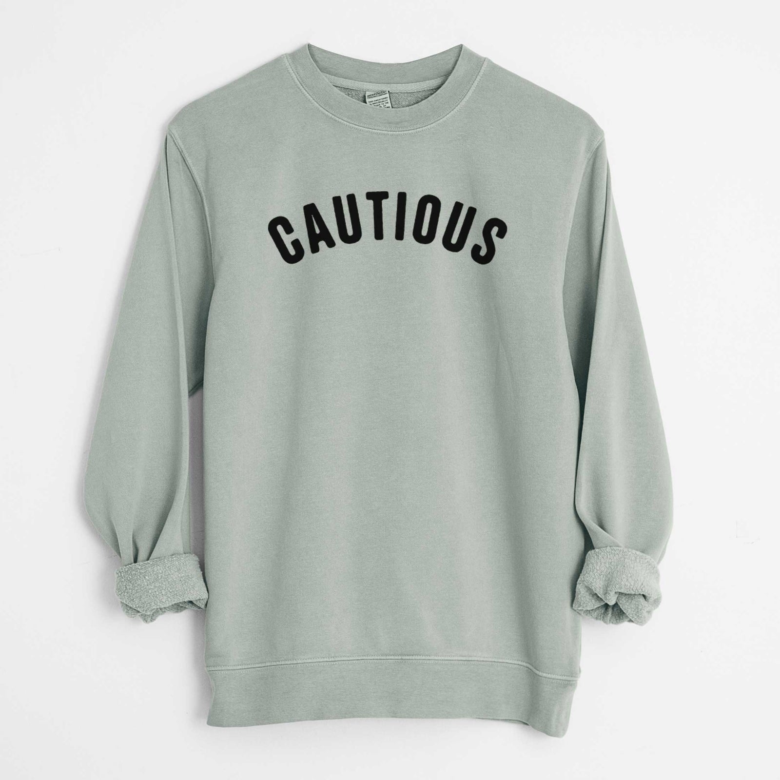 'Cautious - Articulate Collection' design on a Sage Unisex pigment dyed crew sweatshirt