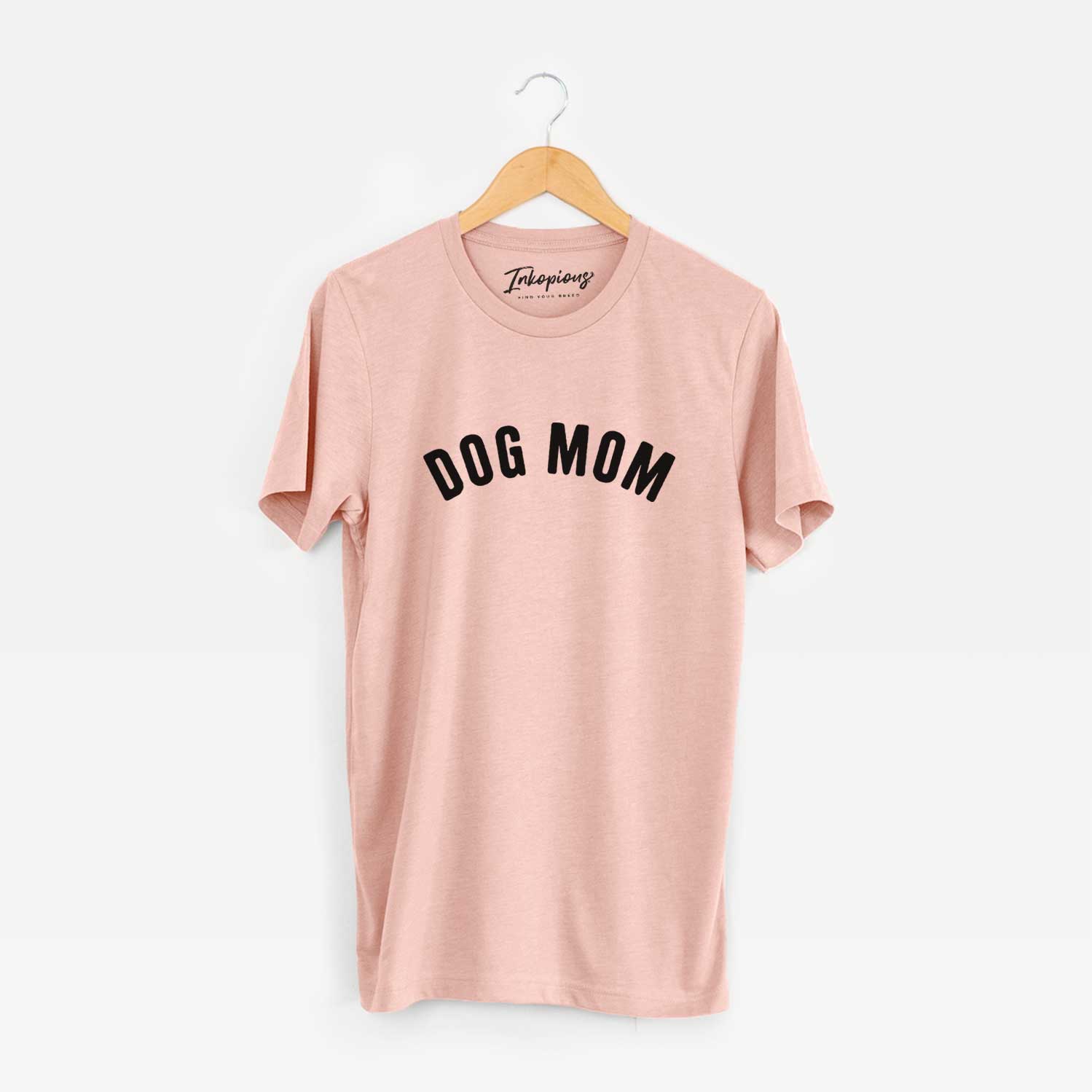 'Dog Mom - Articulate Collection' design on a Peach Unisex crewneck