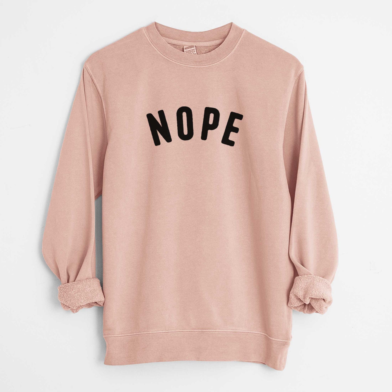 'Nope - Articulate Collection' design on a Dusty Pink Unisex pigment dyed crew sweatshirt