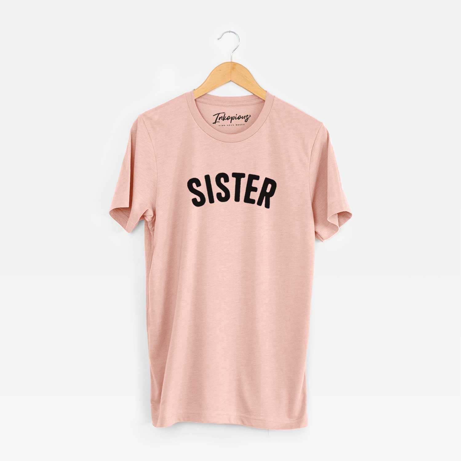 'Sister - Articulate Collection' design on a Peach Unisex crewneck