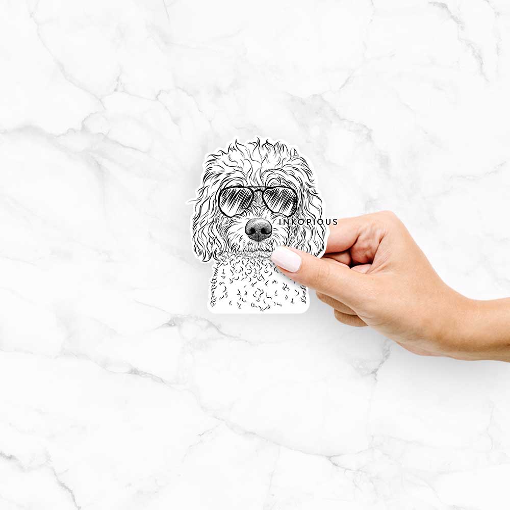 Hand-drawn sketch of Izzie the Cavachon wearing aviator sunglasses on an Izzie Cavachon decal sticker