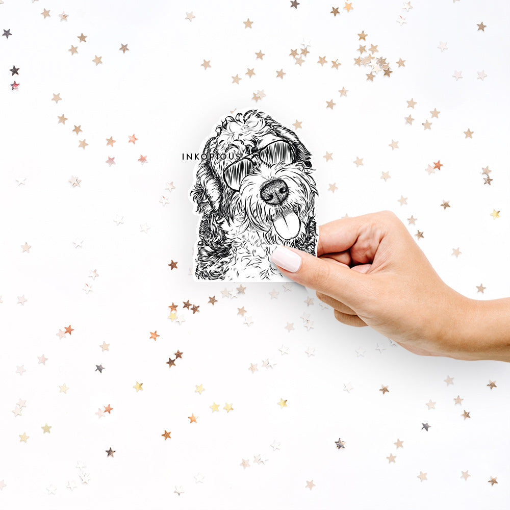 Hand-drawn sketch of Kaci the Bernedoodle wearing aviator sunglasses on a decal sticker