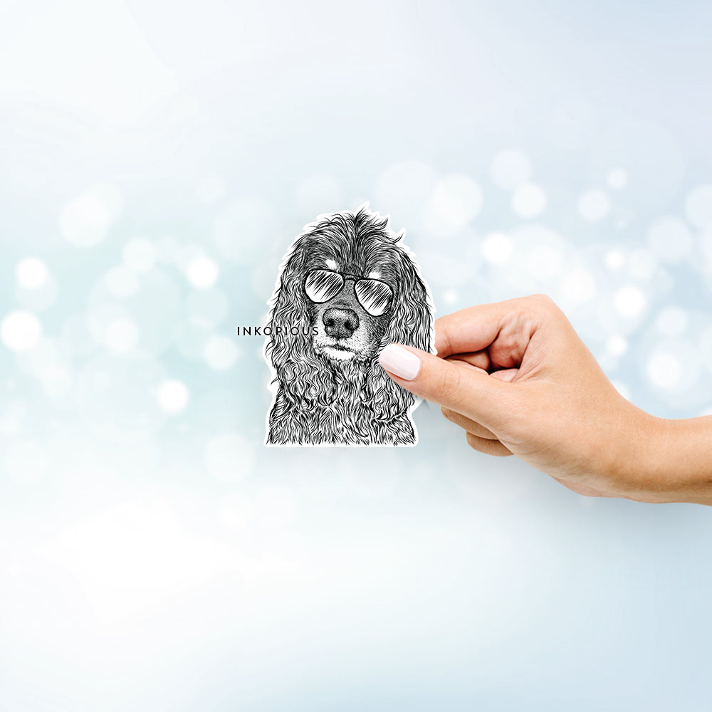 Hand-drawn sketch of Marley Boy the American Cocker Spaniel wearing aviator sunglasses on a decal sticker