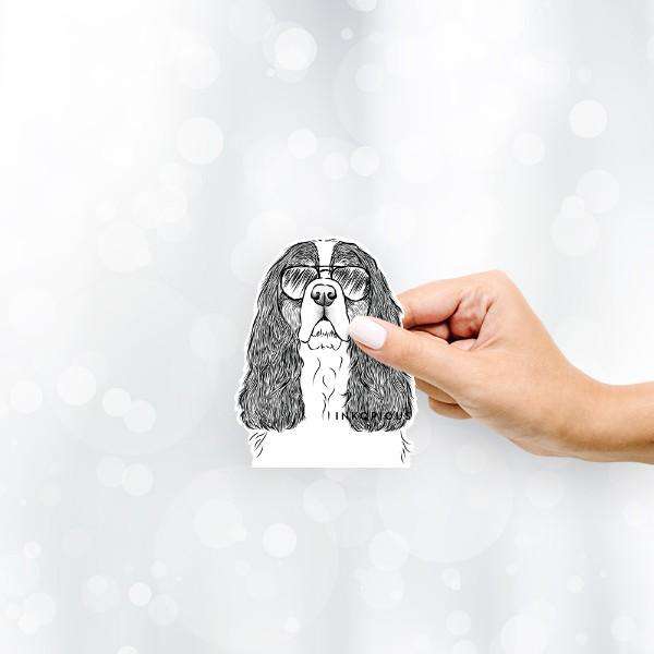 Hand-drawn sketch of Sebastian the Cavalier King Charles Spaniel wearing aviator sunglasses on a decal sticker