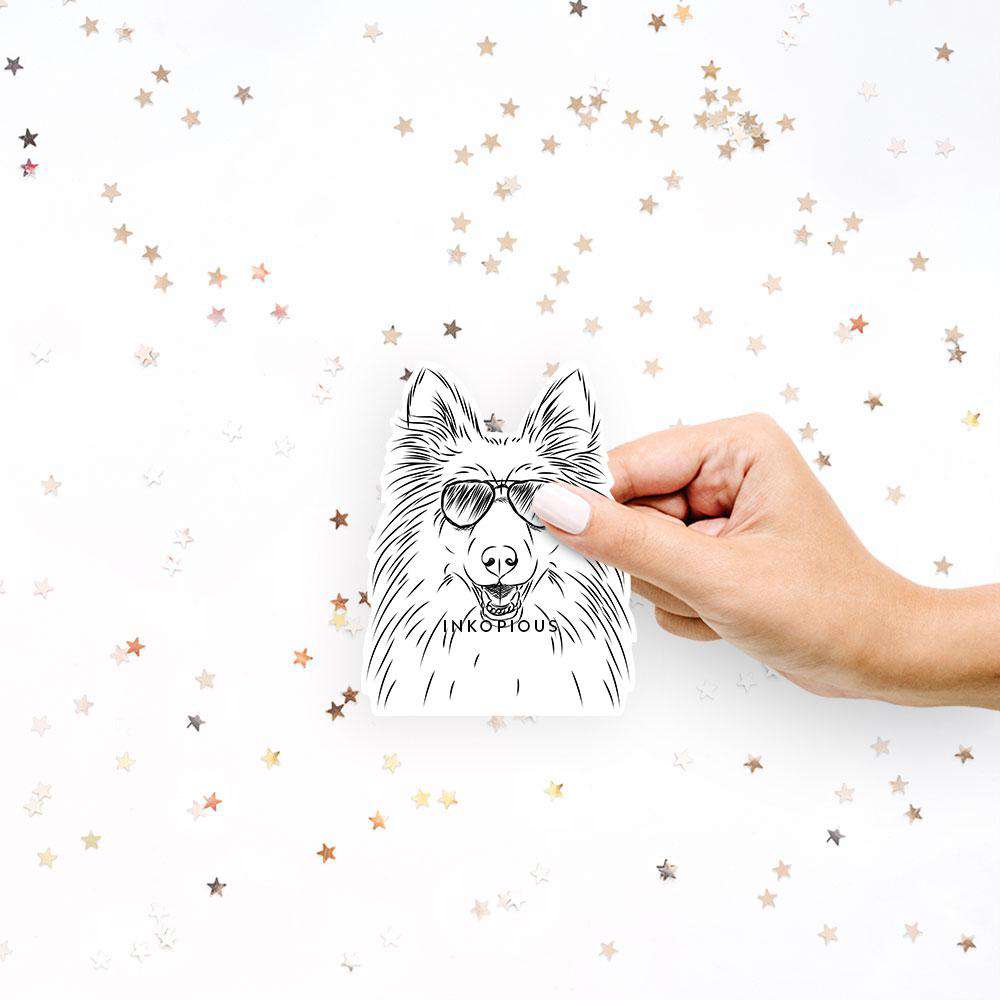 Hand-drawn sketch of Sheldon the Shetland Sheepdog wearing aviator sunglasses on a decal sticker