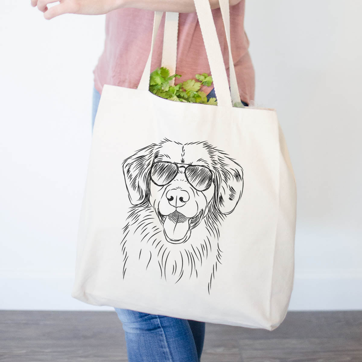 Hand-drawn sketch of Weston the Nova Scotia Duck Tolling Retriever wearing aviator sunglasses on a tote