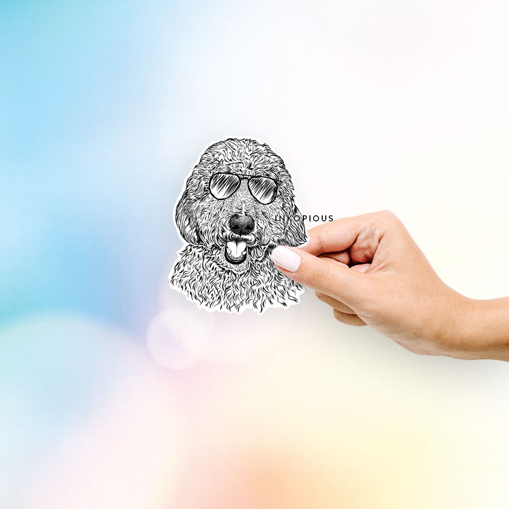 Hand-drawn sketch of Whisper the Goldendoodle wearing aviator sunglasses on a decal sticker