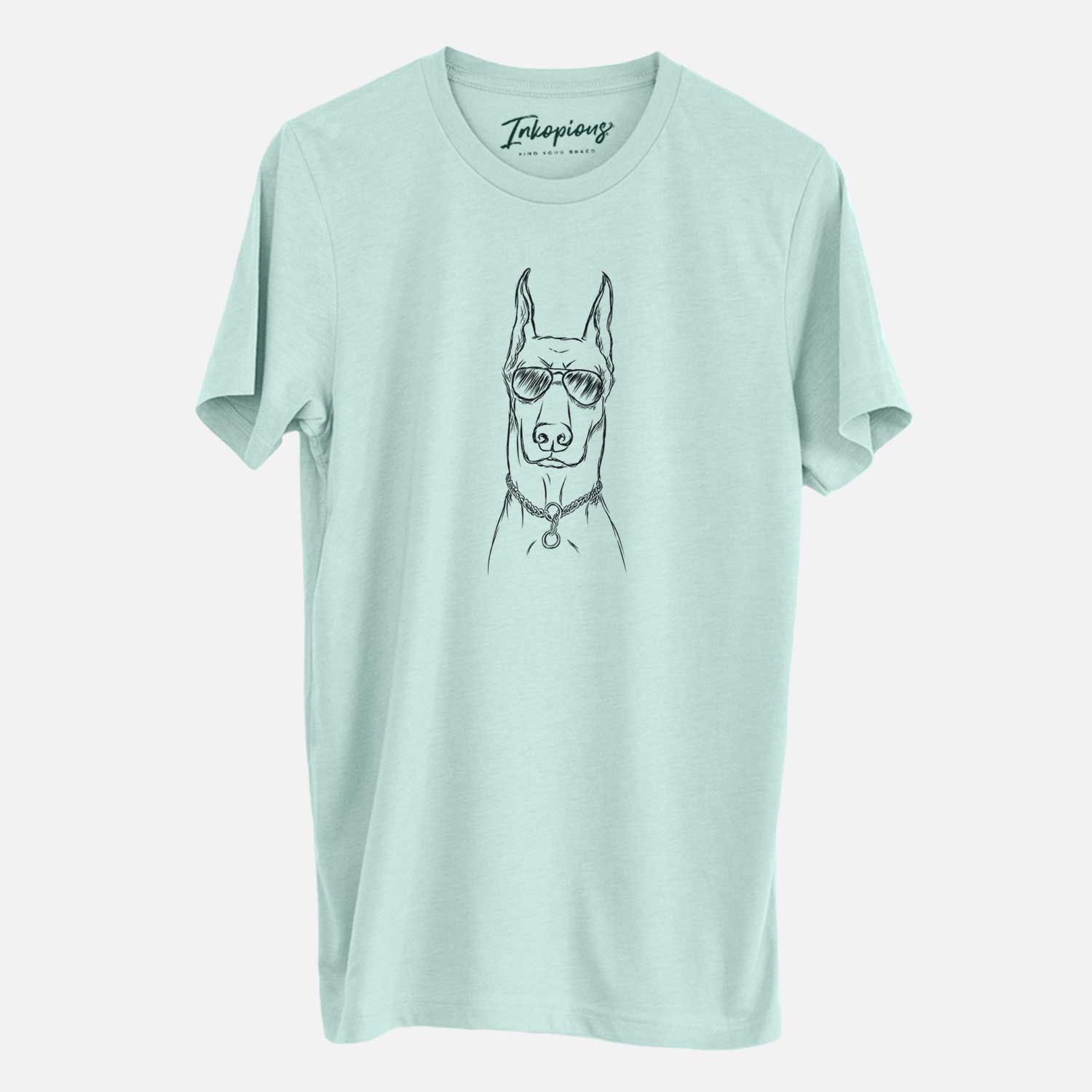 Hand-drawn sketch of Ace the Doberman Pinscher wearing aviator sunglasses on a Heather Sage Unisex crewneck