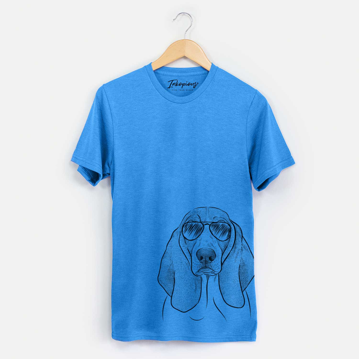 Hand-drawn sketch of Addison the Basset Hound wearing aviator sunglasses on a Blue Unisex crewneck