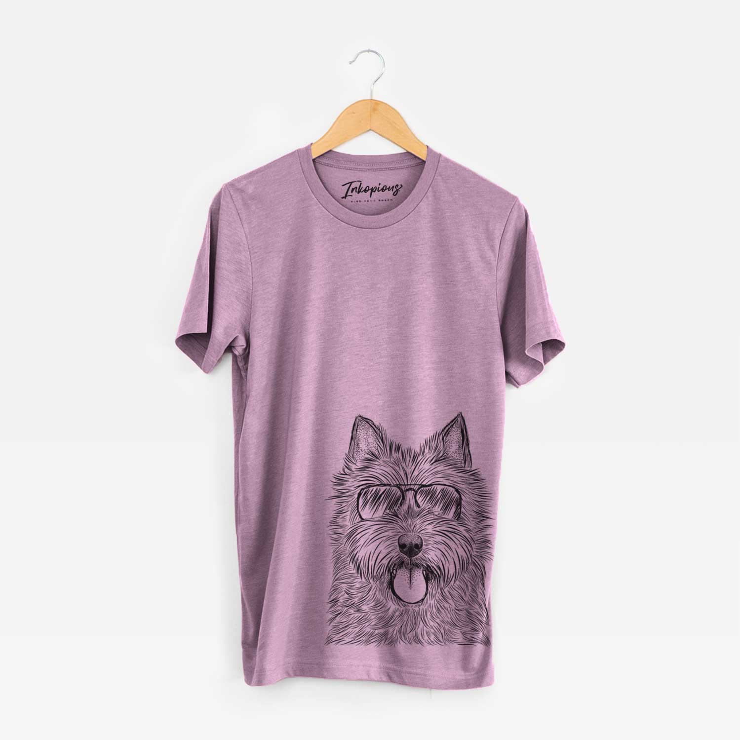 Hand-drawn sketch of Alfie the Norwich Terrier wearing aviator sunglasses on an Orchid Unisex crewneck