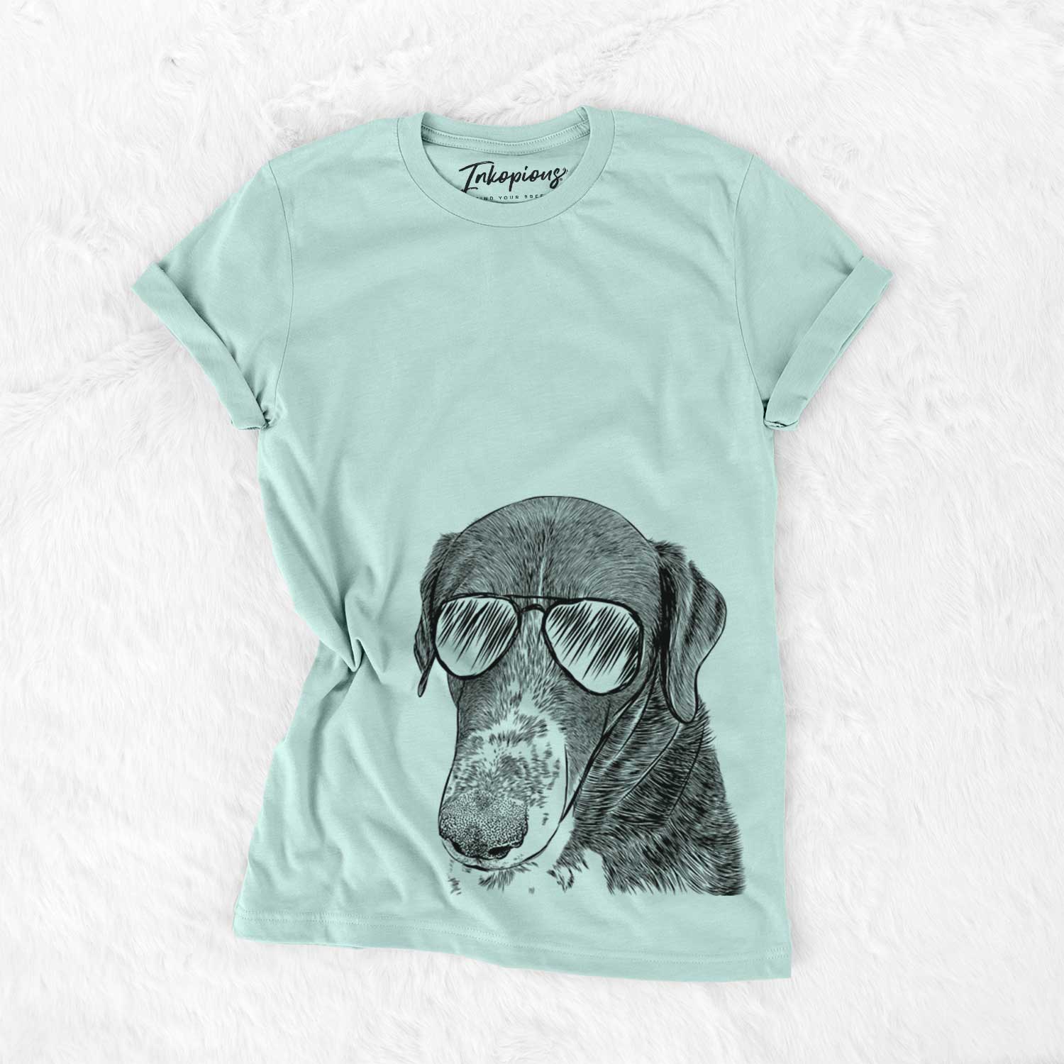 Hand-drawn sketch of Angel Orion the Mixed Breed wearing aviator sunglasses on a Heather Sage Unisex crewneck