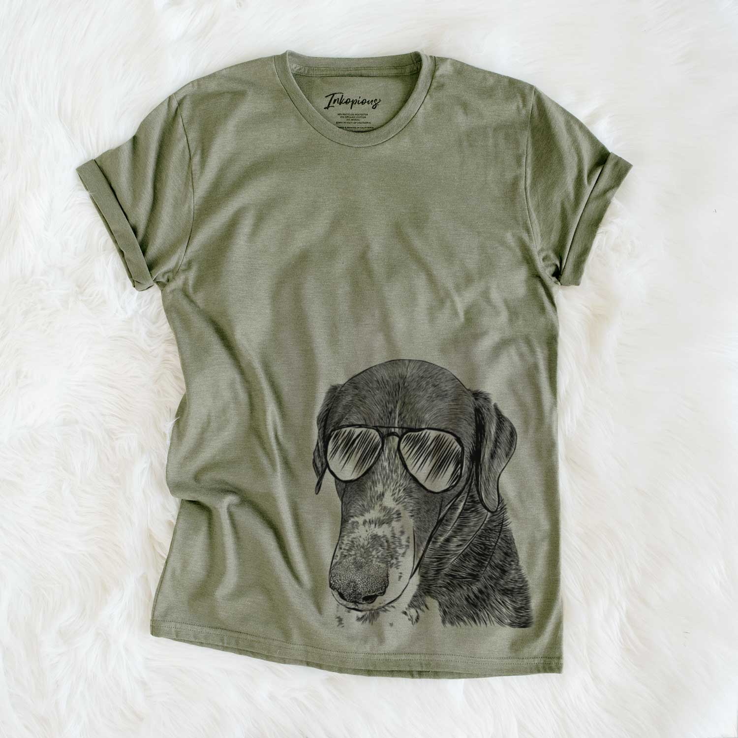 Hand-drawn sketch of Angel Orion the Mixed Breed wearing aviator sunglasses on an Olive Unisex crewneck