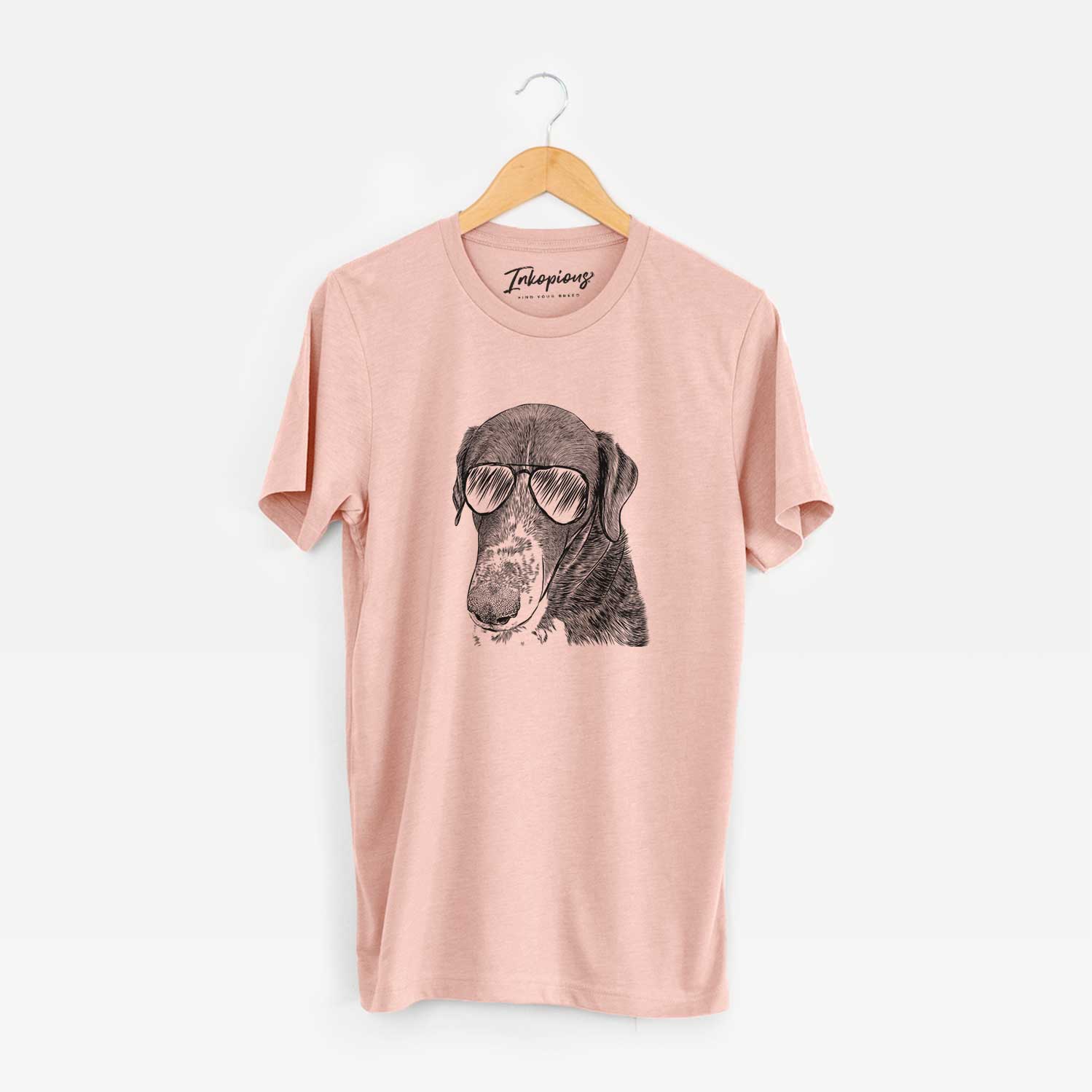 Hand-drawn sketch of Angel Orion the Mixed Breed wearing aviator sunglasses on a Peach Unisex crewneck