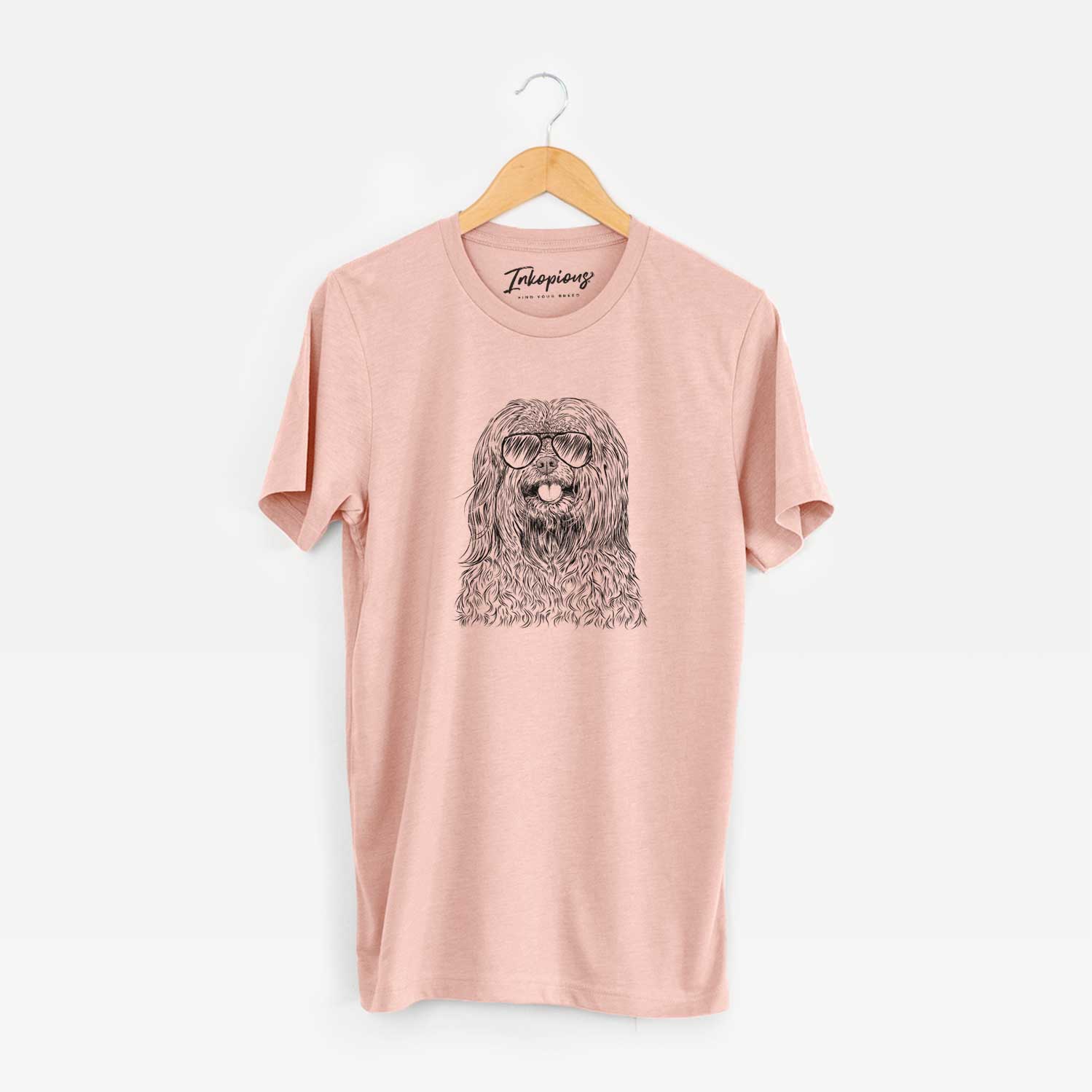 Hand-drawn sketch of Annie the Mixed Breed wearing aviator sunglasses on a Peach Unisex crewneck