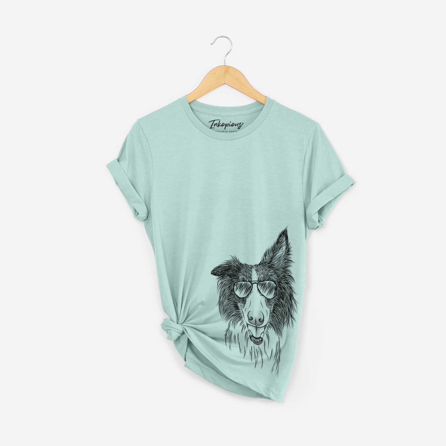 Hand-drawn sketch of Archie the Silken Windhound wearing aviator sunglasses on a Heather Sage Bella Canvas Unisex Crewneck