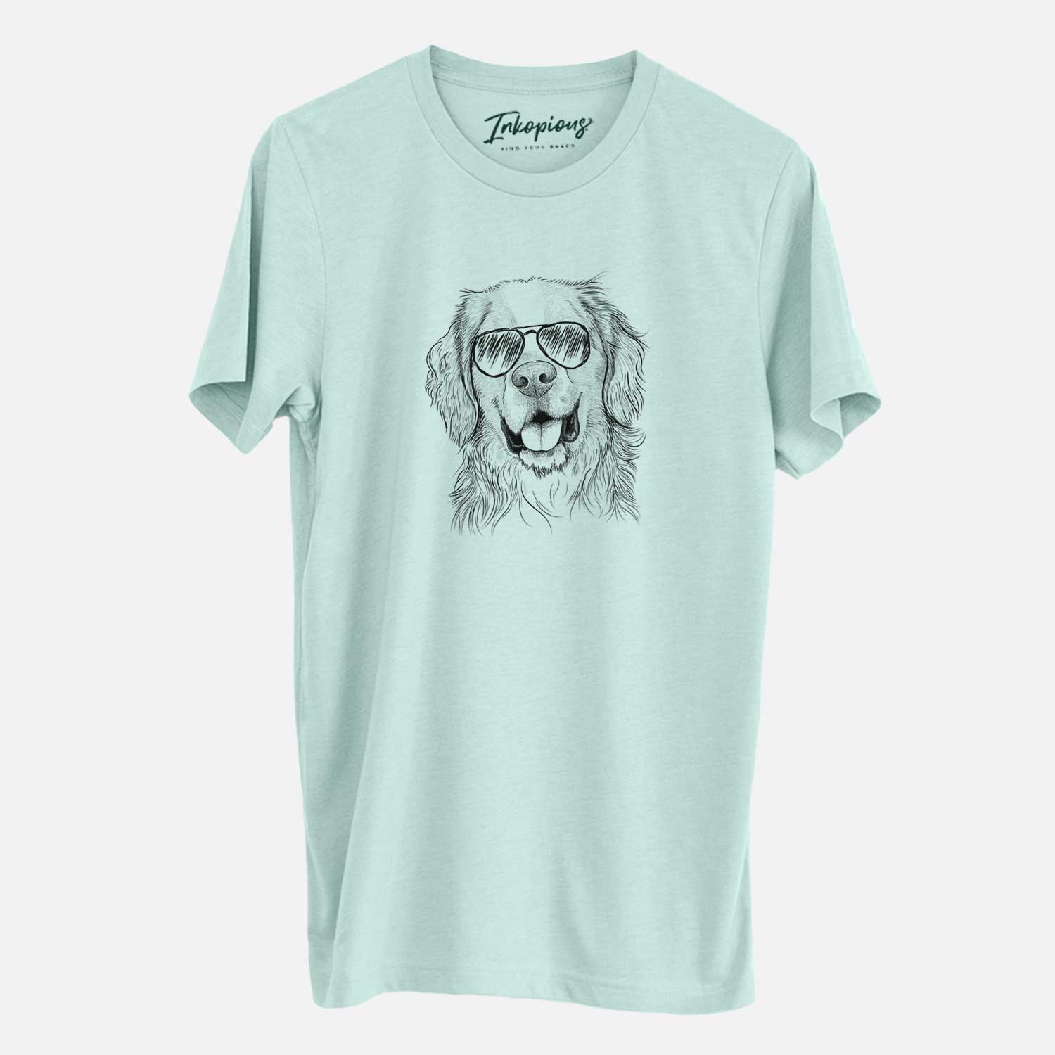 Hand-drawn sketch of Archie Benjamin the Mixed Breed wearing aviator sunglasses on a Heather Sage Unisex crewneck