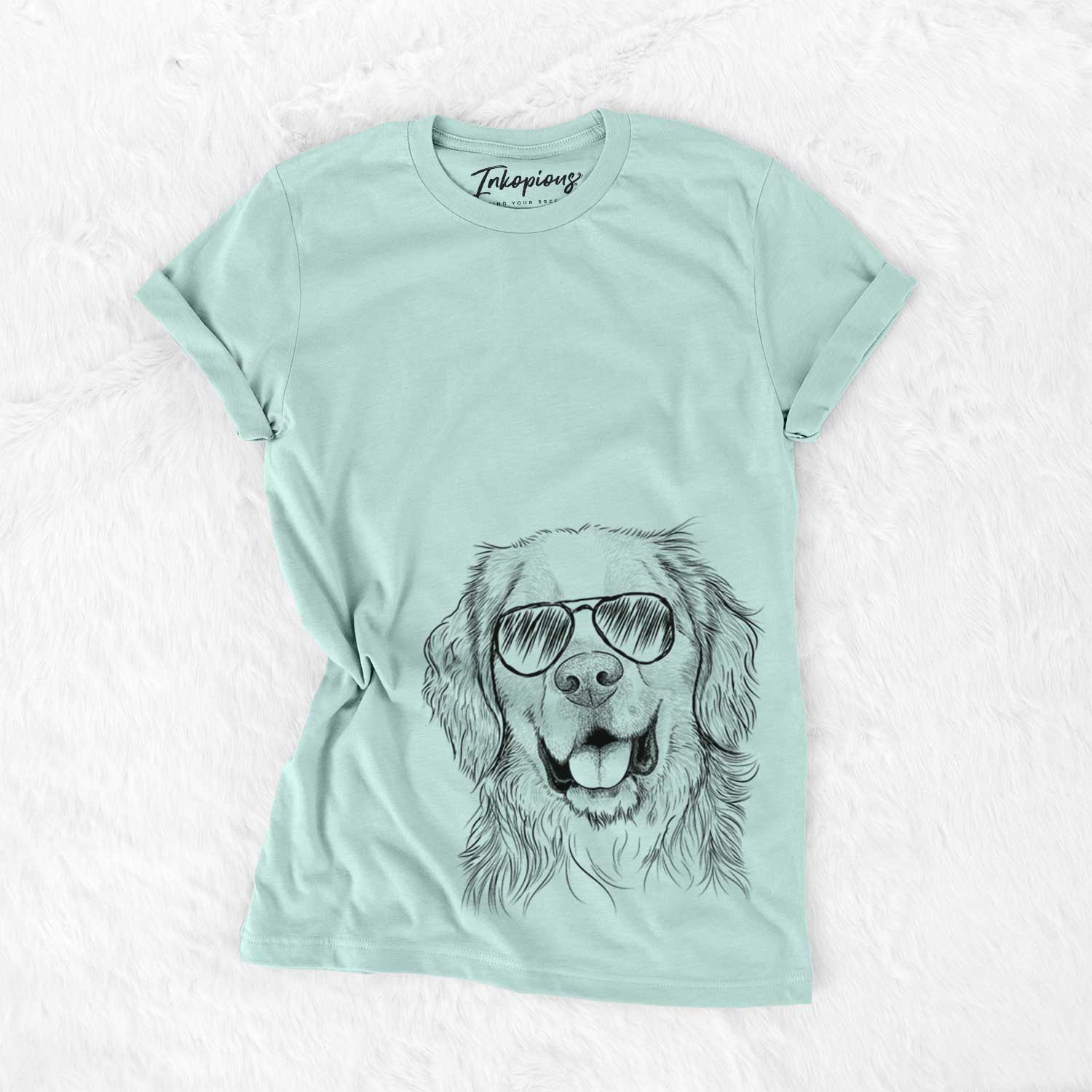 Hand-drawn sketch of Archie Benjamin the Mixed Breed wearing aviator sunglasses on a Heather Sage Unisex crewneck