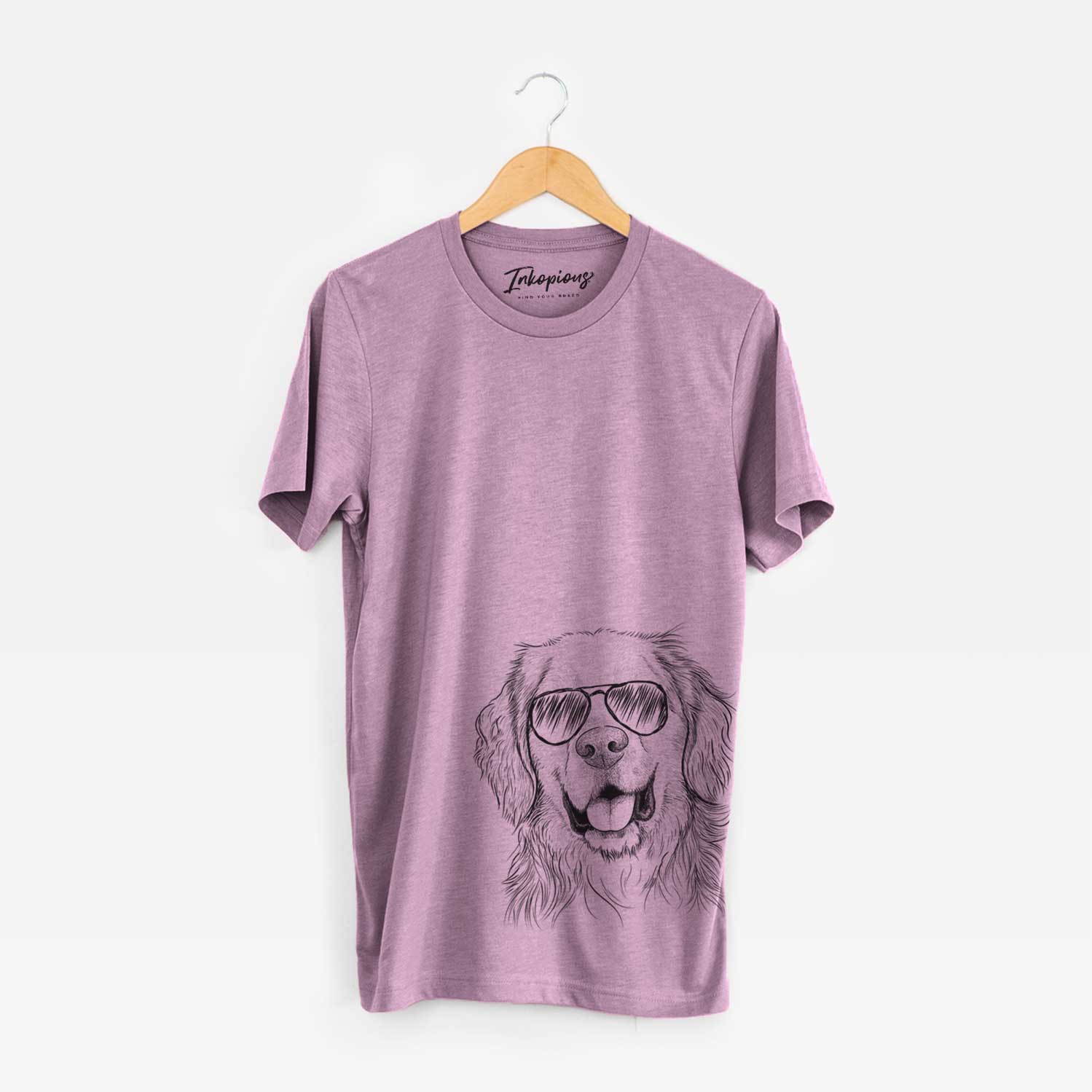 Hand-drawn sketch of Archie Benjamin the Mixed Breed wearing aviator sunglasses on an Orchid Unisex crewneck