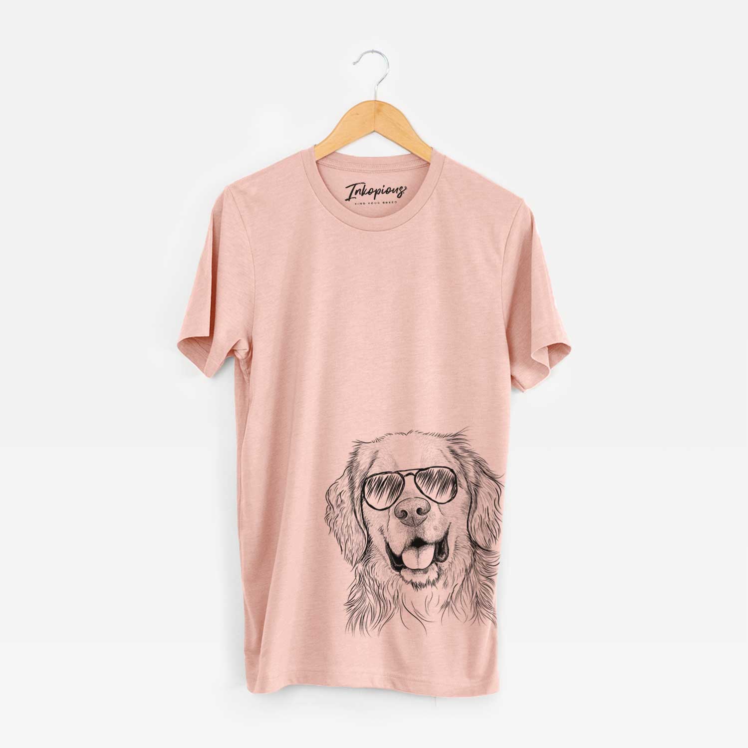 Hand-drawn sketch of Archie Benjamin the Mixed Breed wearing aviator sunglasses on a Peach Unisex crewneck