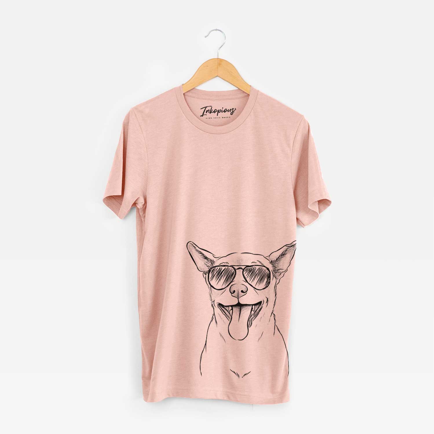 Hand-drawn sketch of Archie the Chihuahua Mix wearing aviator sunglasses on a Peach Bella Canvas Unisex Crewneck