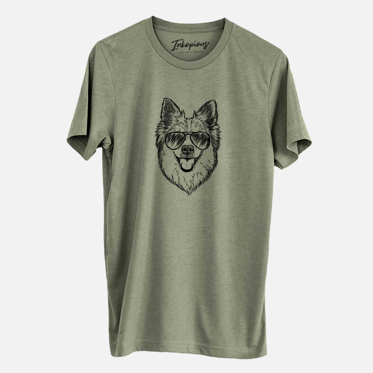 Hand-drawn sketch of Ari the Icelandic Sheepdog wearing aviator sunglasses on an Olive Unisex crewneck