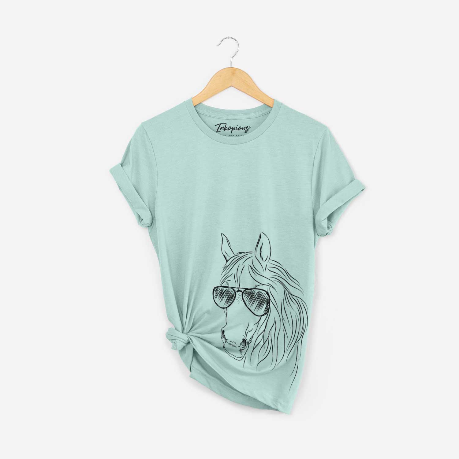 Hand-drawn sketch of Aria the Horse wearing aviator sunglasses on a Heather Sage Bella Canvas Unisex Crewneck